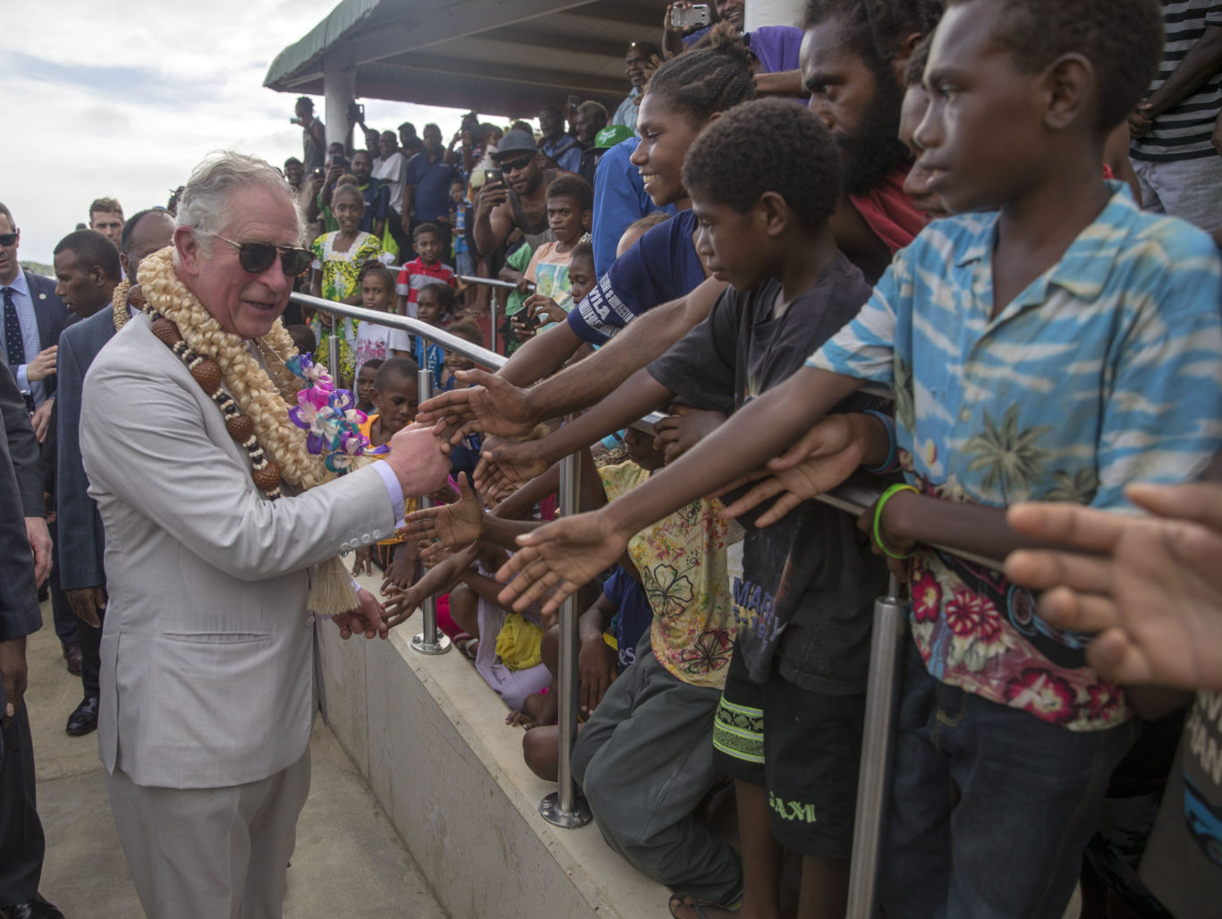 The Prince of Wales greets well-wishers during a visit to Haos blong Handikraf (Steve Parsons/PA)