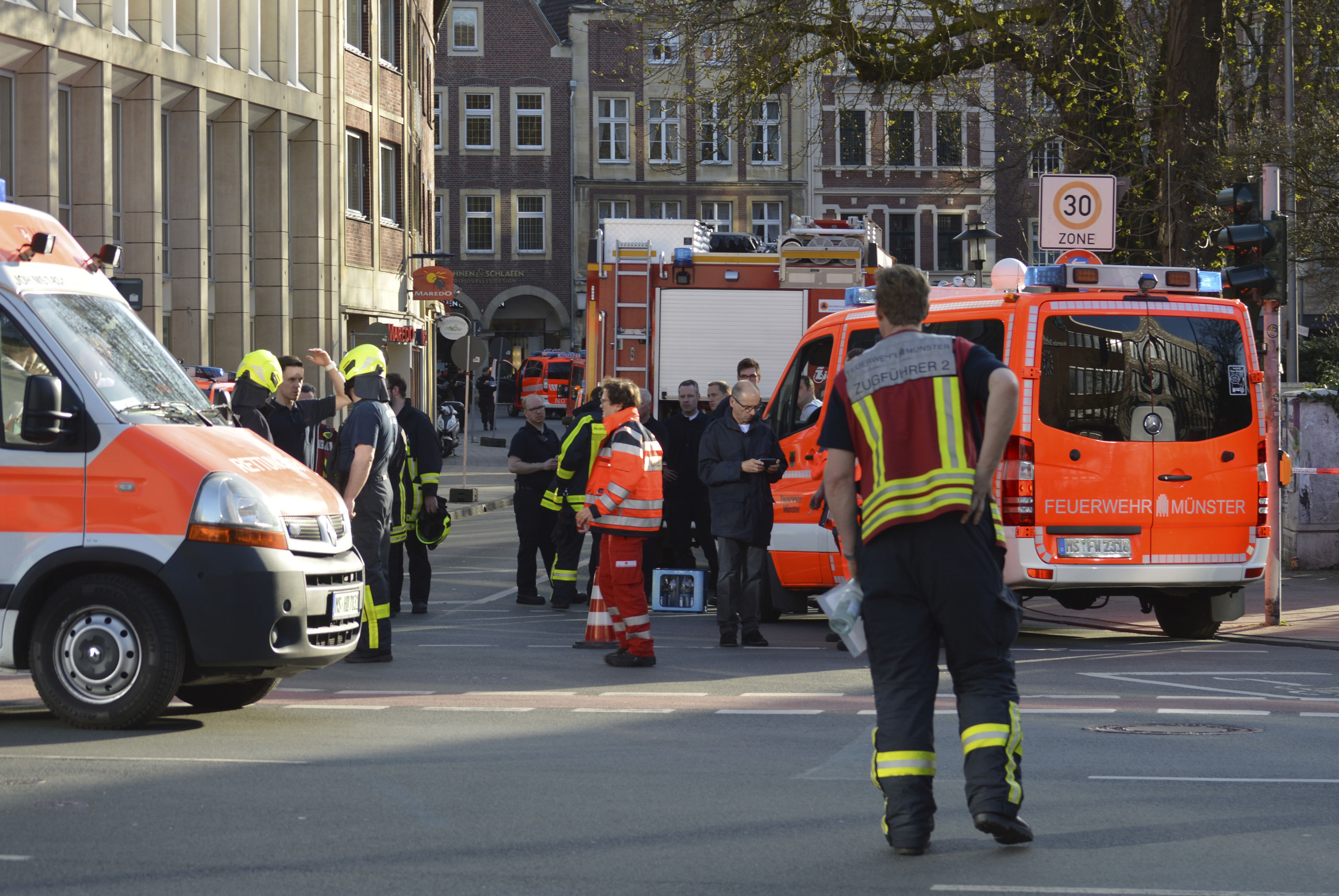 Rescue workers at the scene (Ferdinand Ostrop/AP)