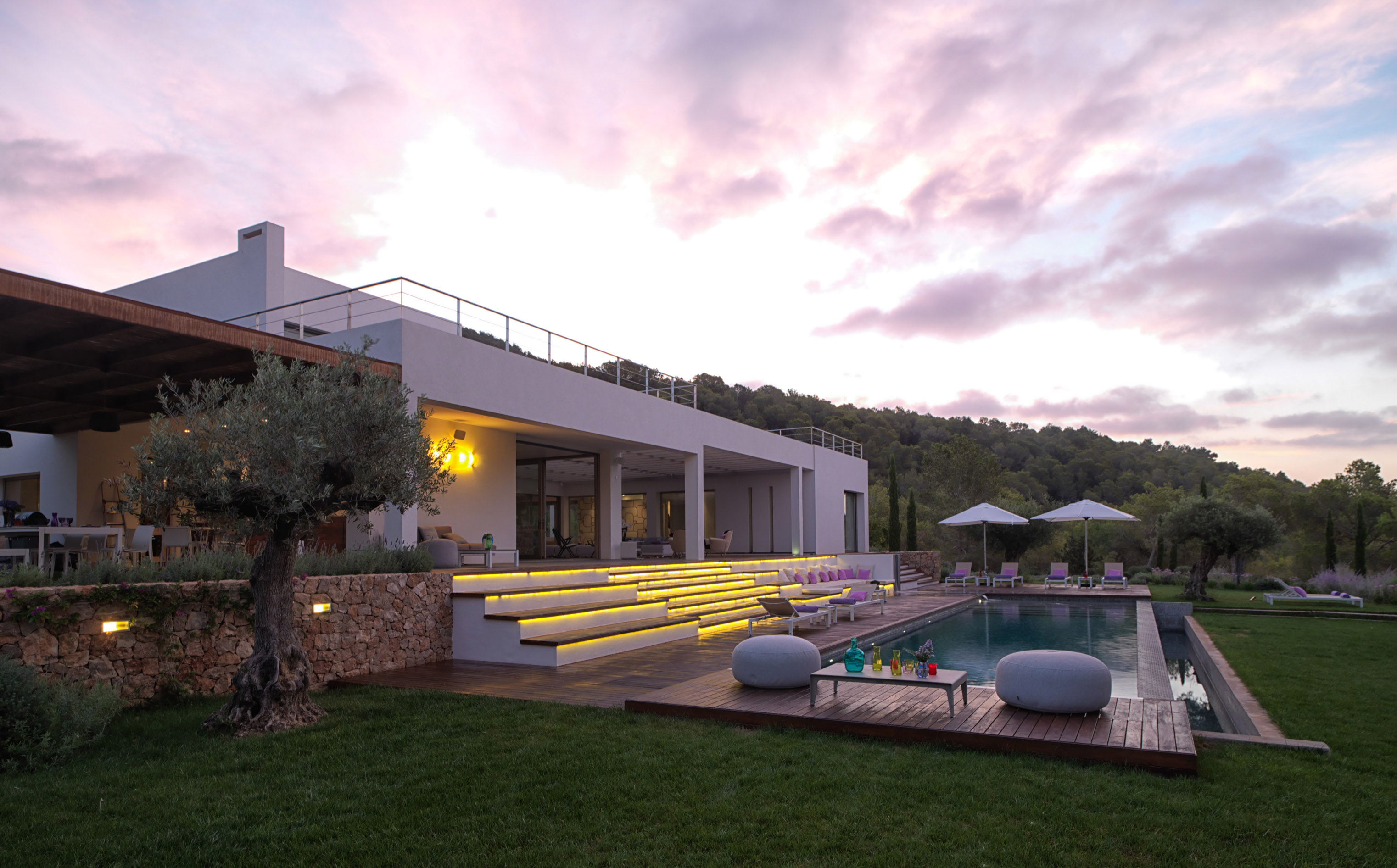 My new home - luxury villa with its salt-water pool surrounded by decking , trees and lavender bushes. (Sofia Gomez Fonzo/The Body Camp/PA)