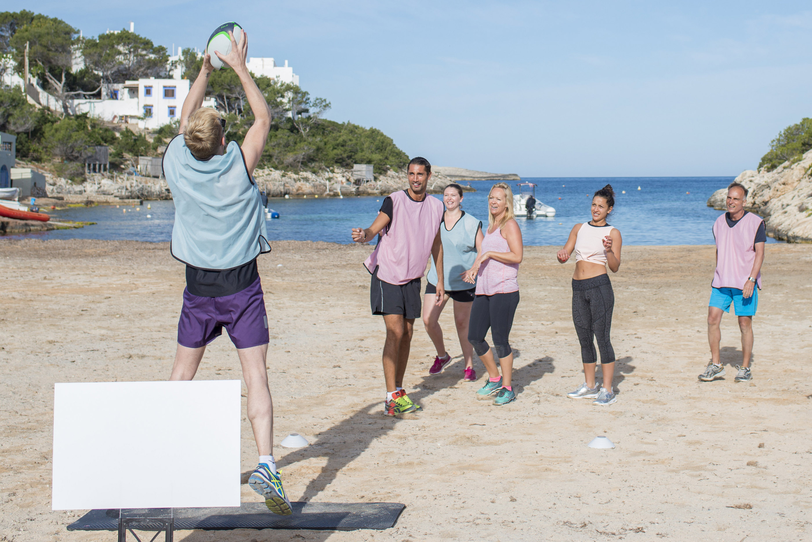 Working out on the beach. (PA)