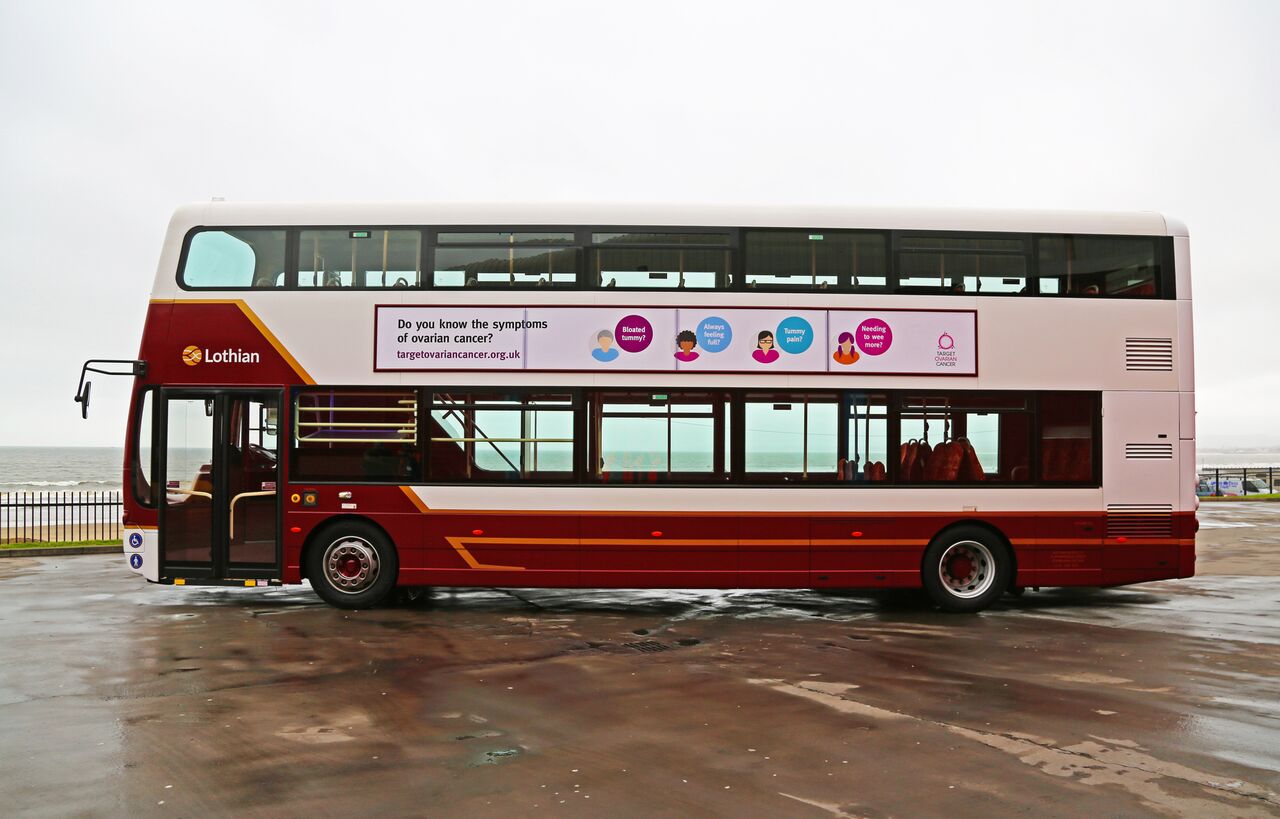 A Lothian buses vehicle with the new signage highlighting the four symptoms of ovarian cancer (Lothian/PA)