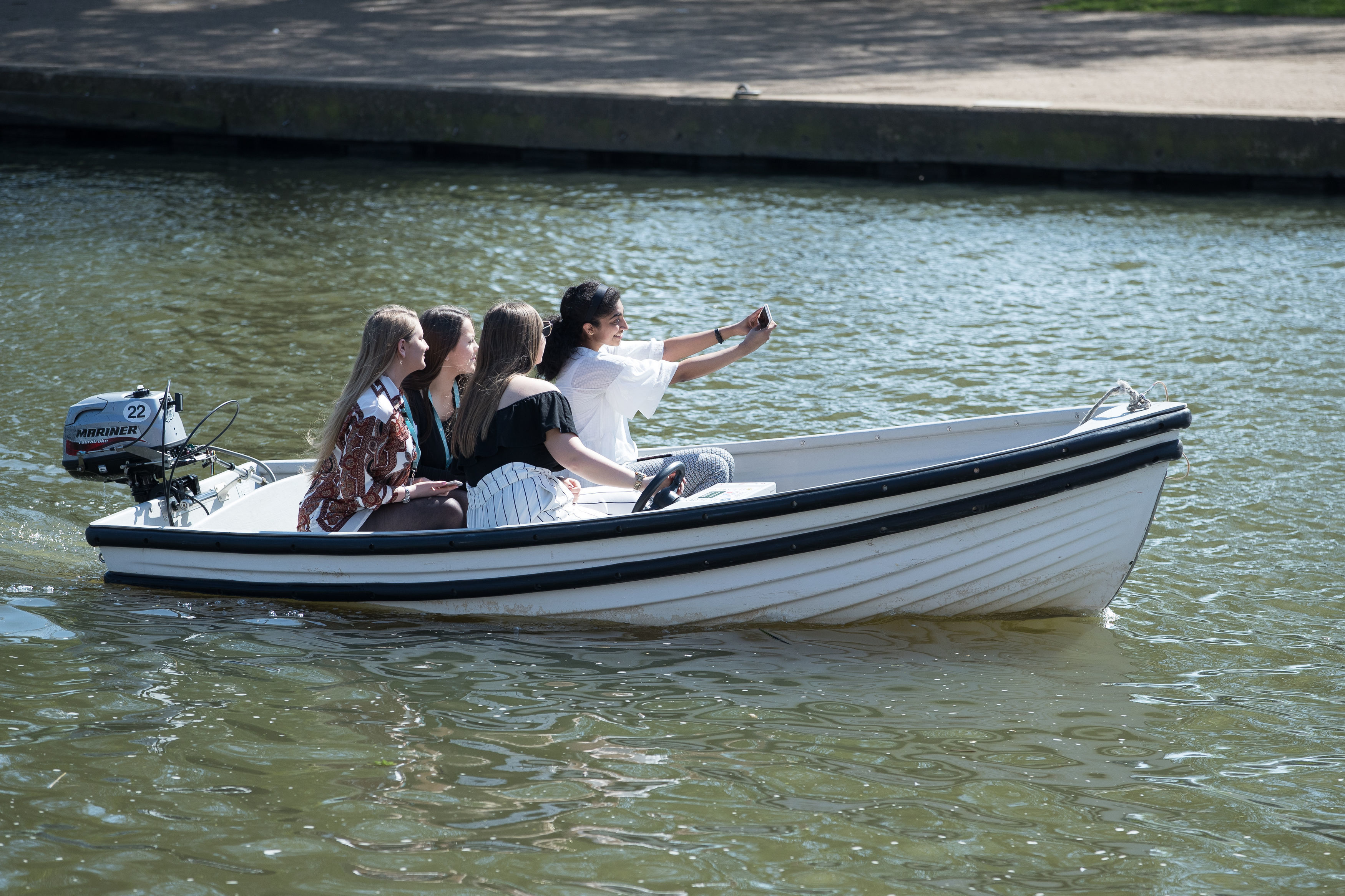 A group of girls take a selfie on a hire boat  in Stratford-upon-Avon (Aaron Chown/PA)