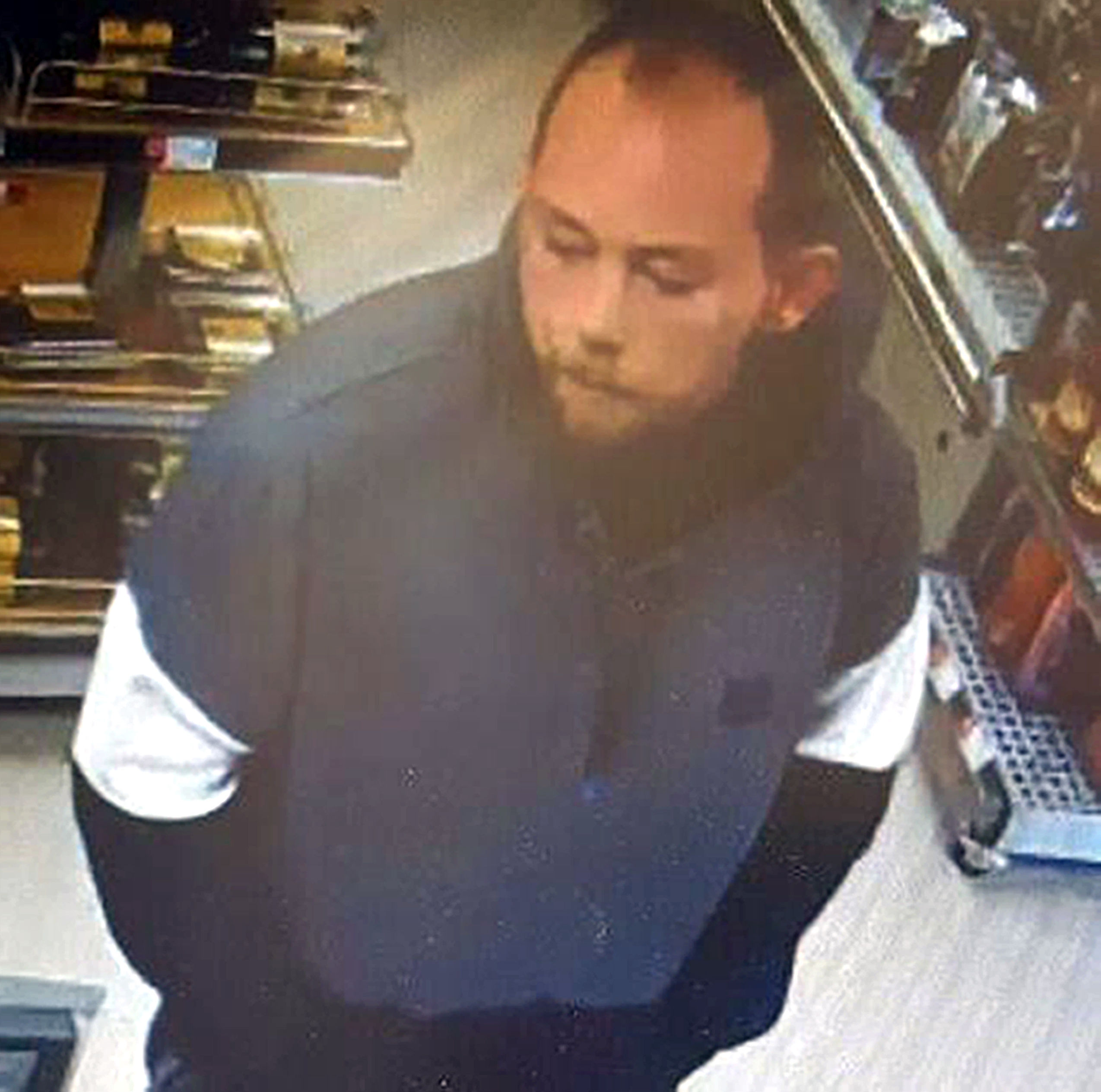 John Tomlin in a shop while trying to evade police (Metropolitan Police/PA)