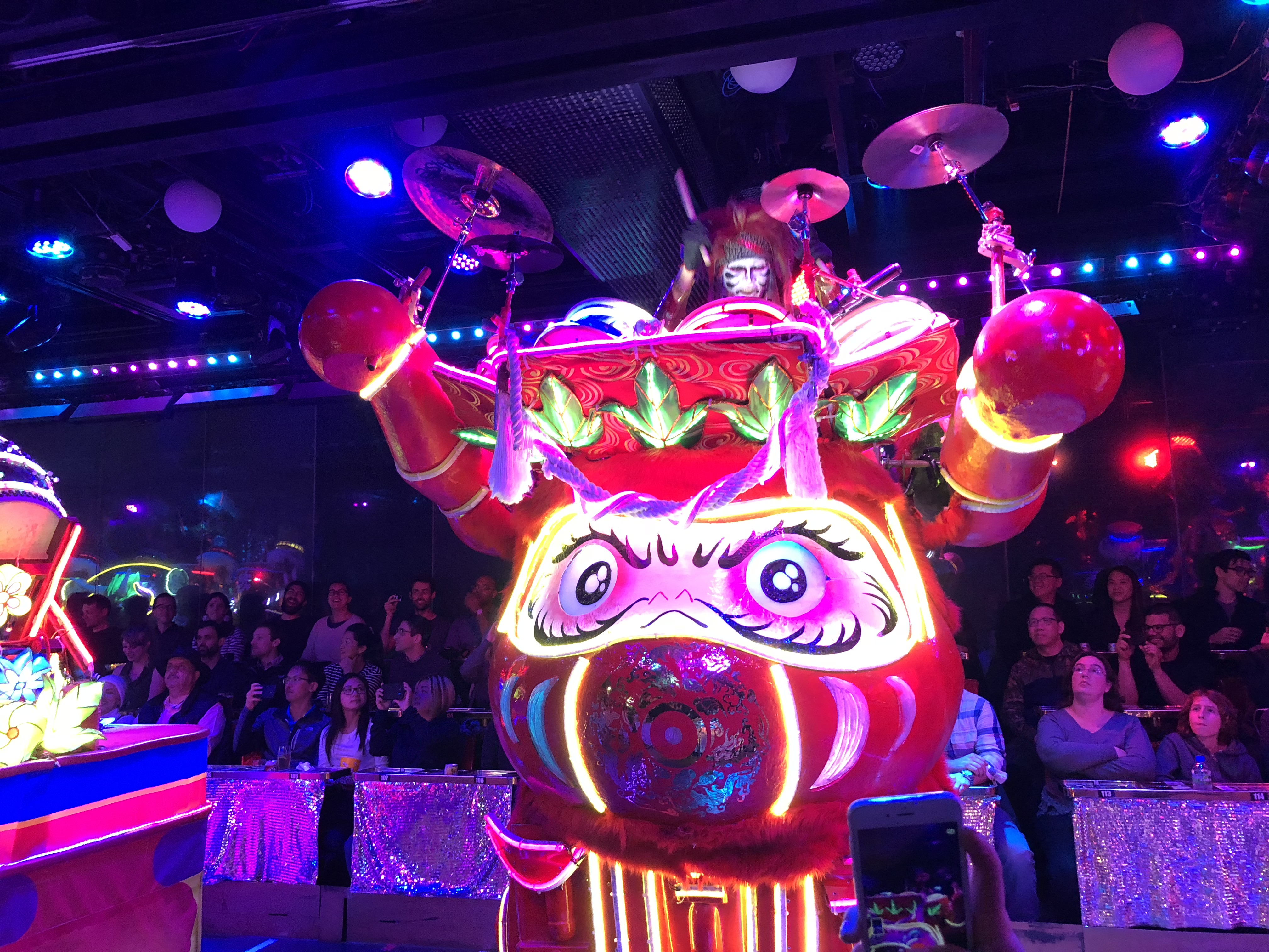 A drummer performs to the audience at the Robot Restaurant (Instagram/PA)