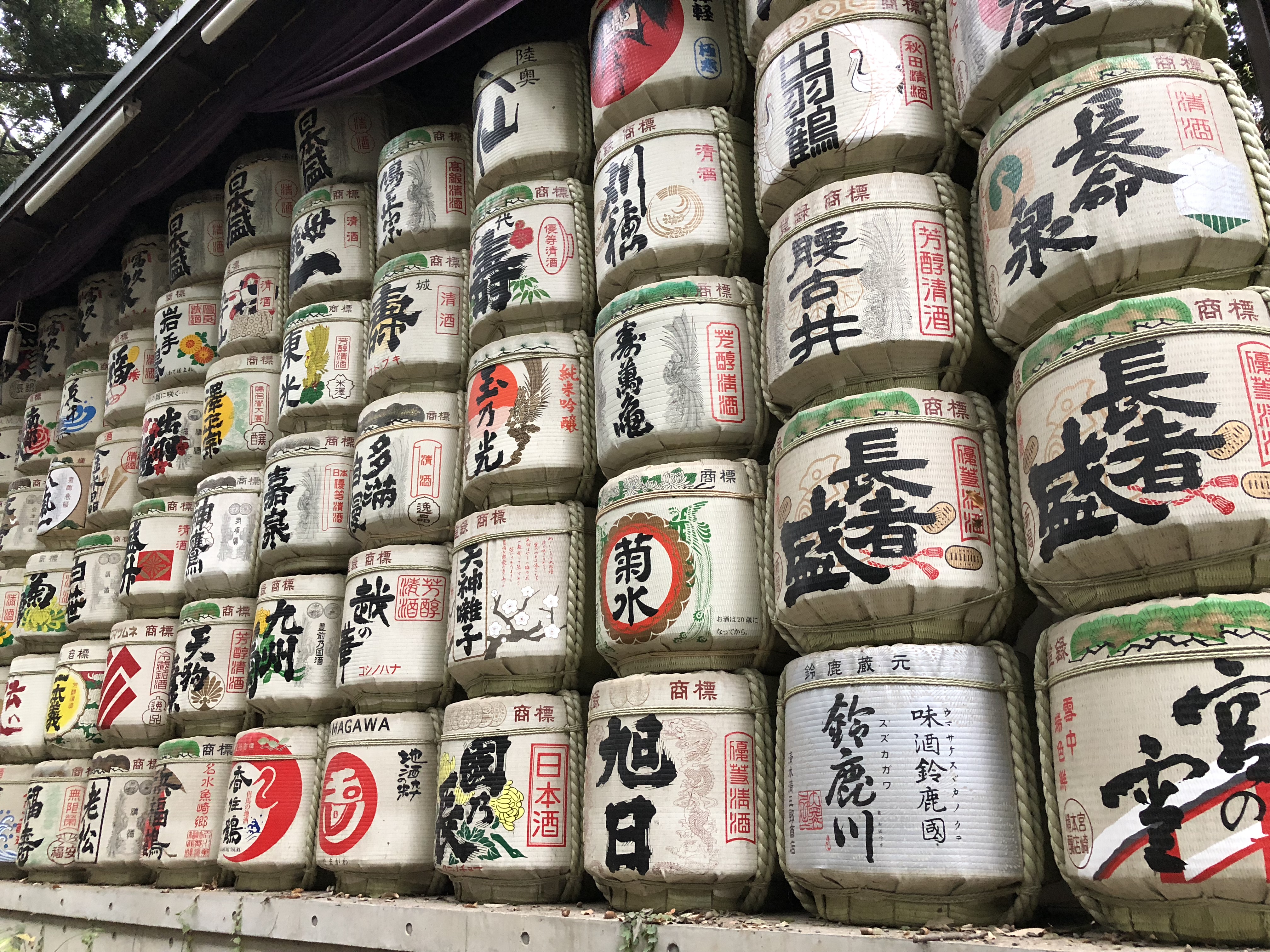 Barrels of sake wrapped in straw at the Meiji Jingu shrine (Damon Smith/PA)
