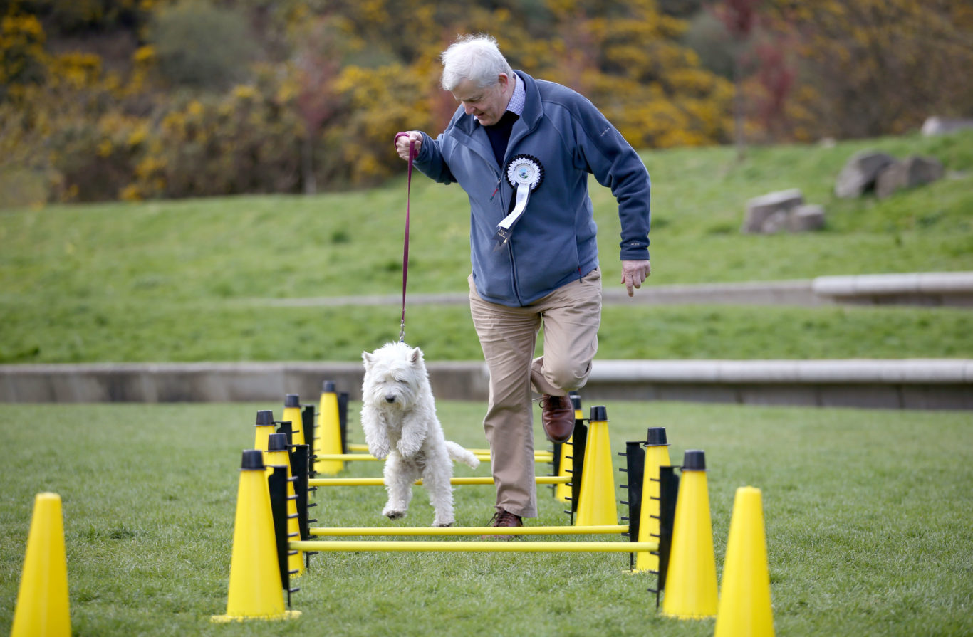 Nice form from Maurice Corry MSP and his dog Bobby (Jane Barlow/PA)