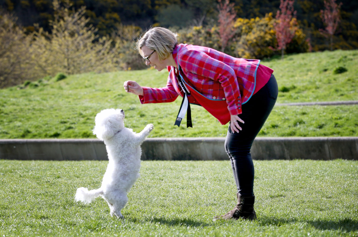 Gillian Martin MSP with her dog Lucy showing who's the boss (Jane Barlow/PA)