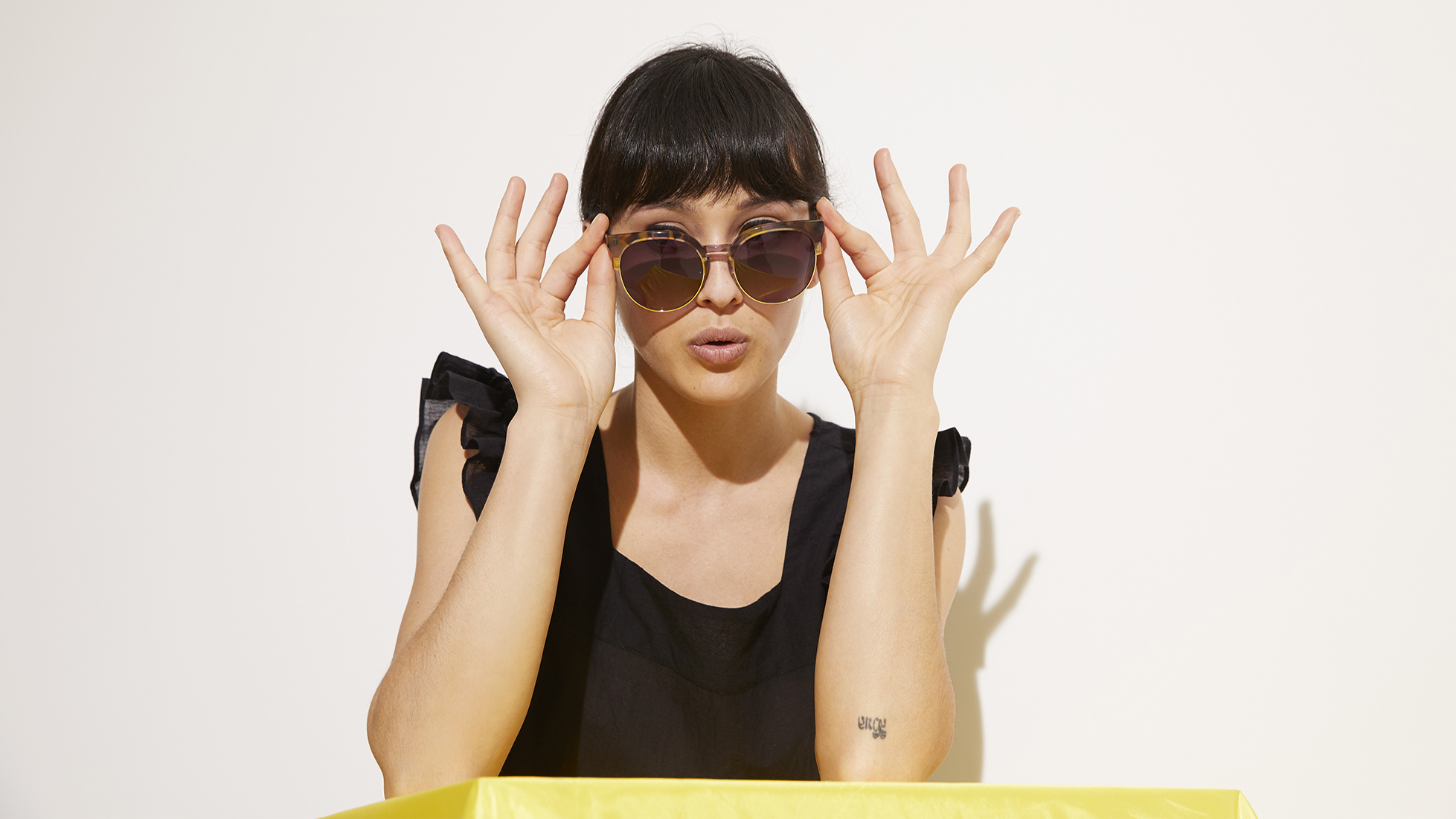 model wearing Oliver Bonas Angelica Multi Tortoiseshell Sunglasses