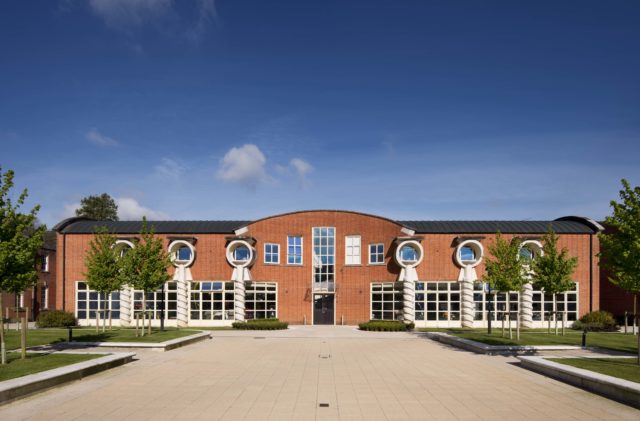 The technology block at Bryanston School, Blandford, Dorset features columns in the shape of screws (Historic England/PA)