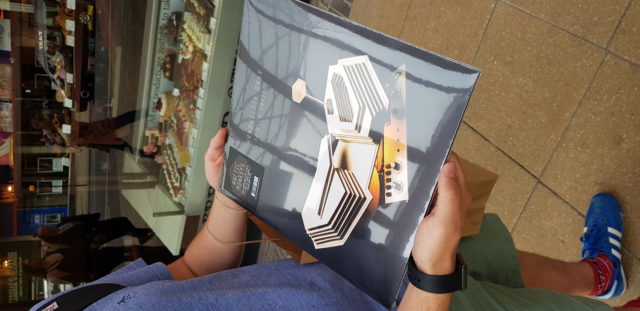 An Arctic Monkeys clutches a limited gold vinyl edition version of the band's new album. 