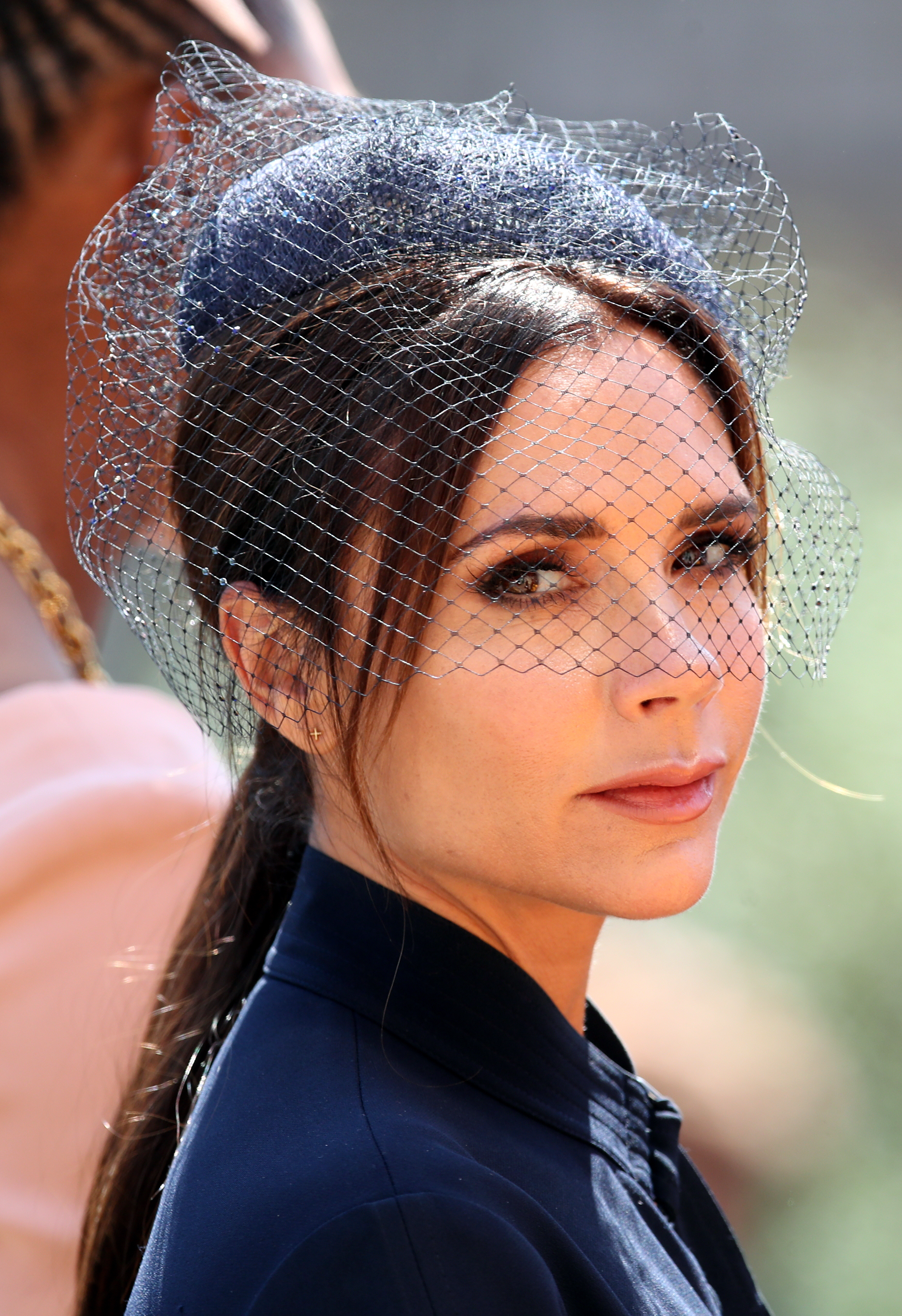 Victoria Beckham leaves St George's Chapel at Windsor Castle after the wedding of Meghan Markle and Prince Harry.