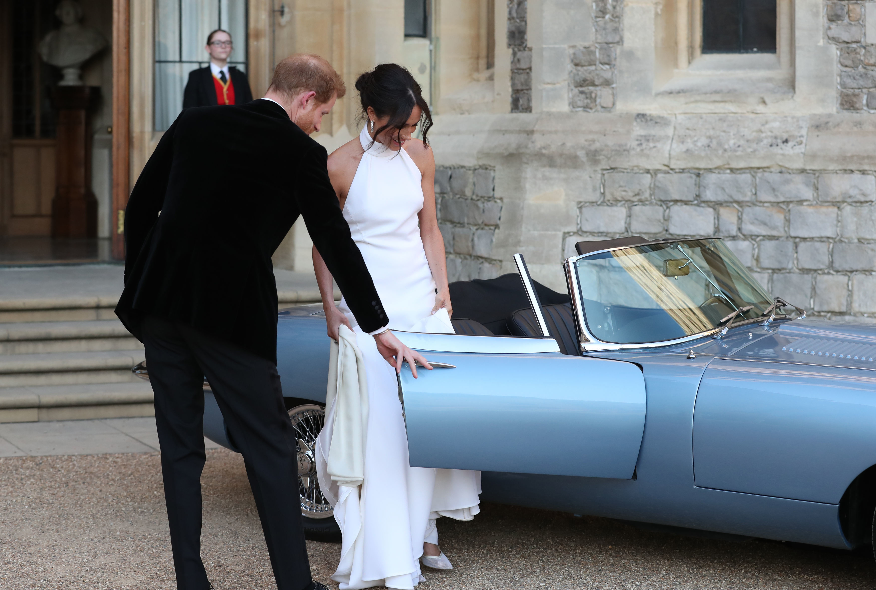 The newly married Duke and Duchess of Sussex, Meghan Markle and Prince Harry, leaving Windsor Castle after their wedding to attend an evening reception at Frogmore House, hosted by the Prince of Wales (Steve Parsons/PA)