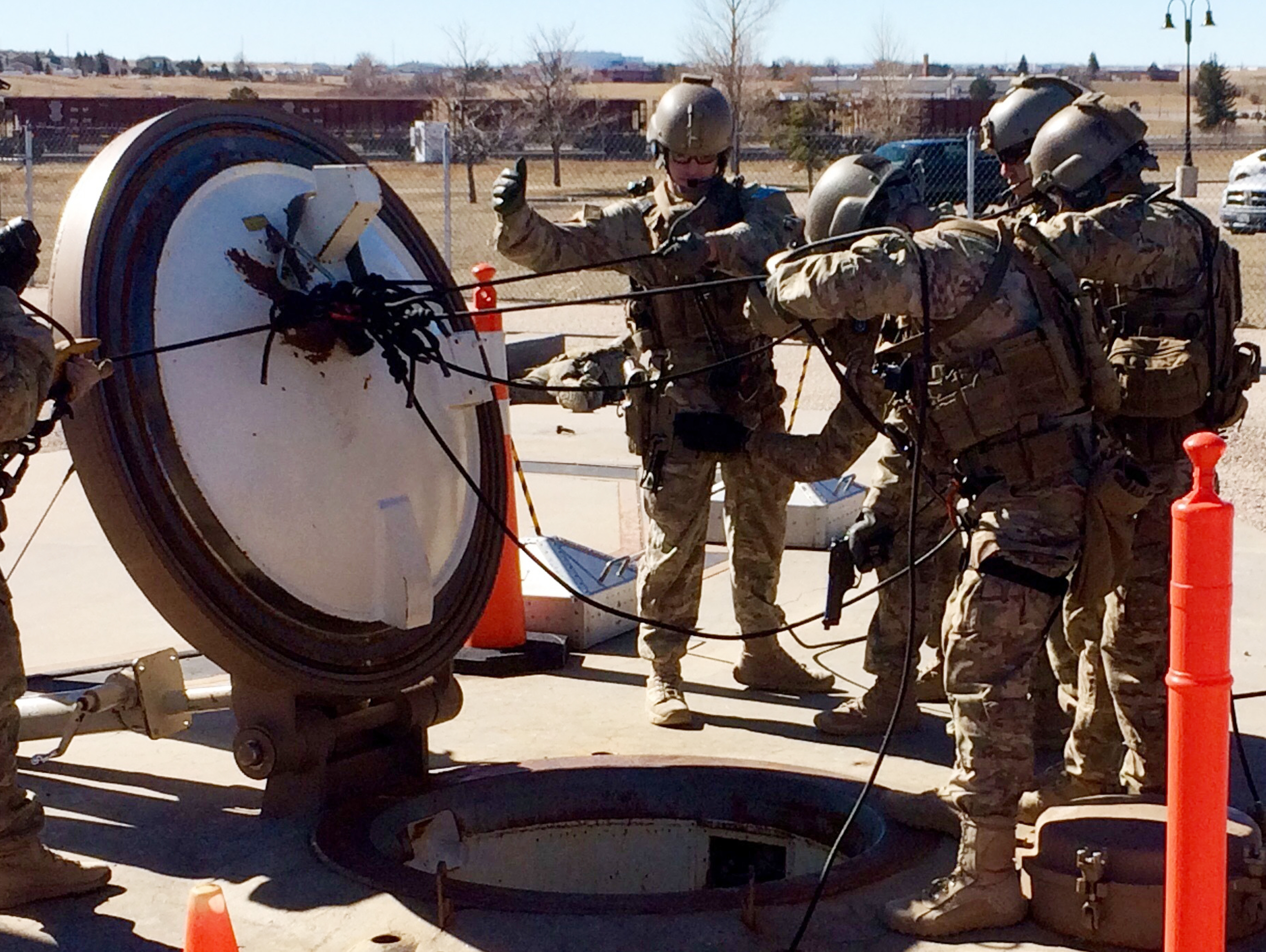 Members of the 790th Missile Security Forces Squadron demonstrate their training for recapturing a Minuteman missile silo after being taken over by an intruder/attacker (Robert Burns/AP)