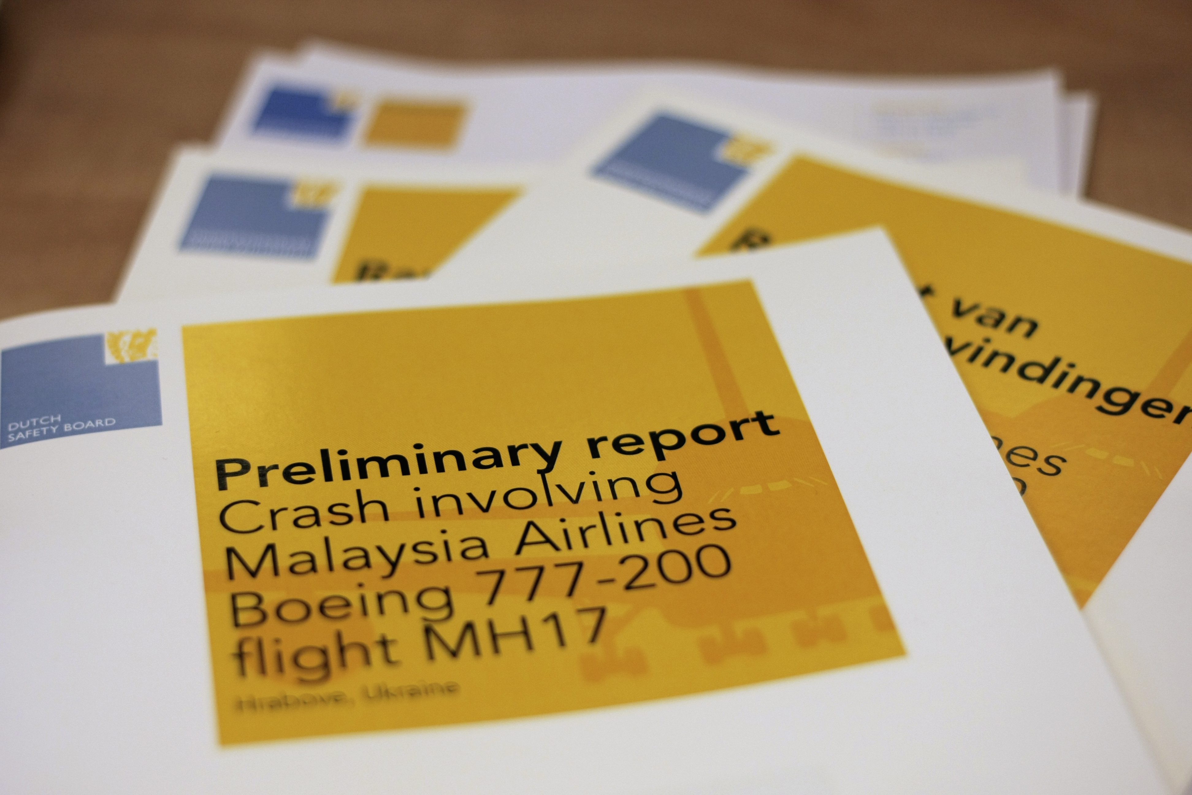 A  stack of preliminary reports by the Dutch Safety Board on the crash of Malaysia Airlines flight MH17 in 2014 (Mike Corder/AP)