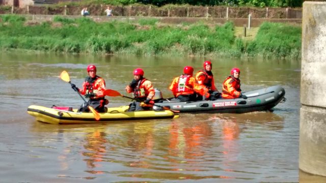 Firefighters used a raft and a boat to reach the stricken sheep at Stowbridge near King's Lynn, Norfolk. (RSPCA/ PA)