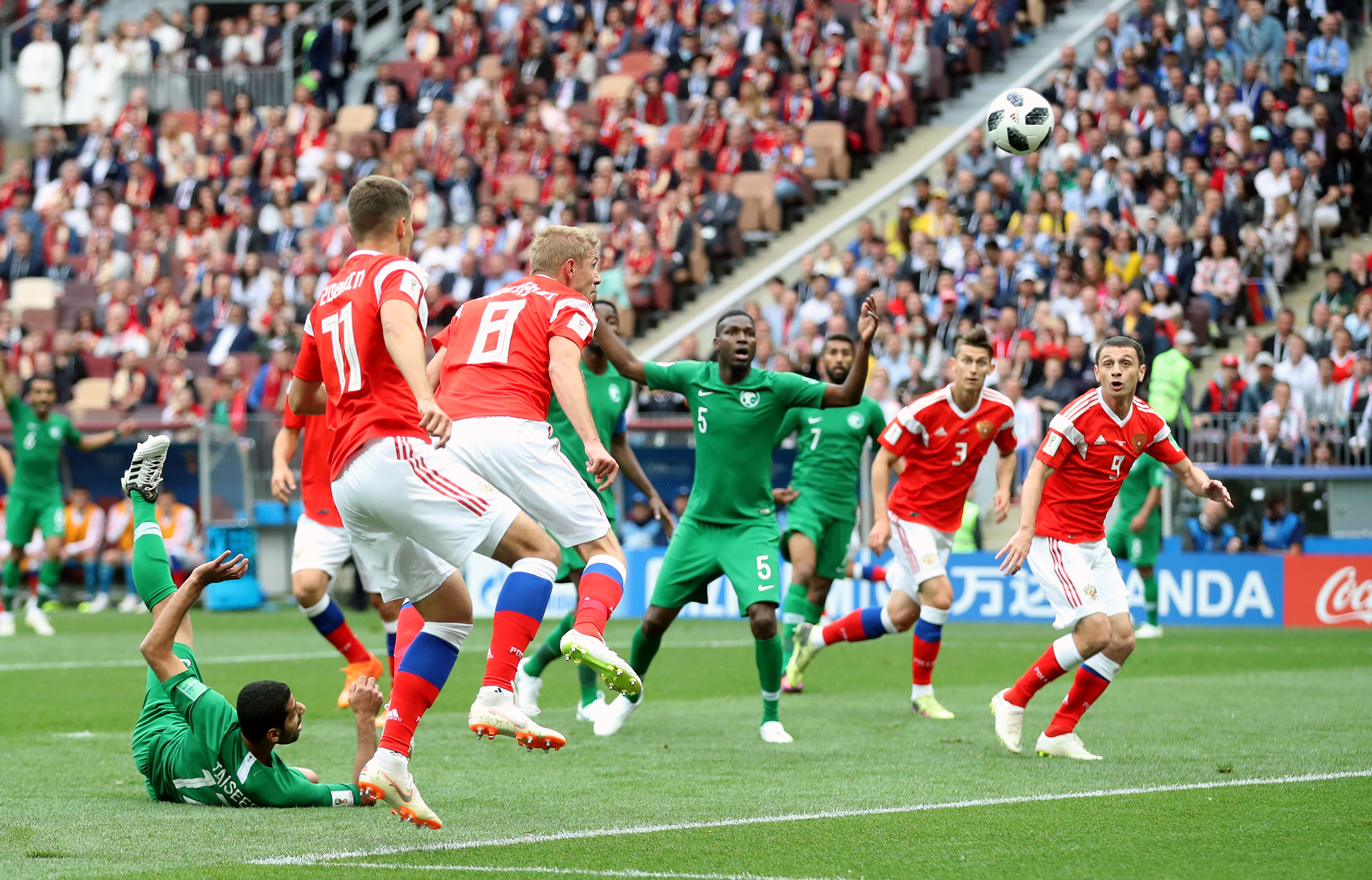 Russia's Yury Gazinsky (no.8) scores his side's first goal of the game (Adam Davy/PA)