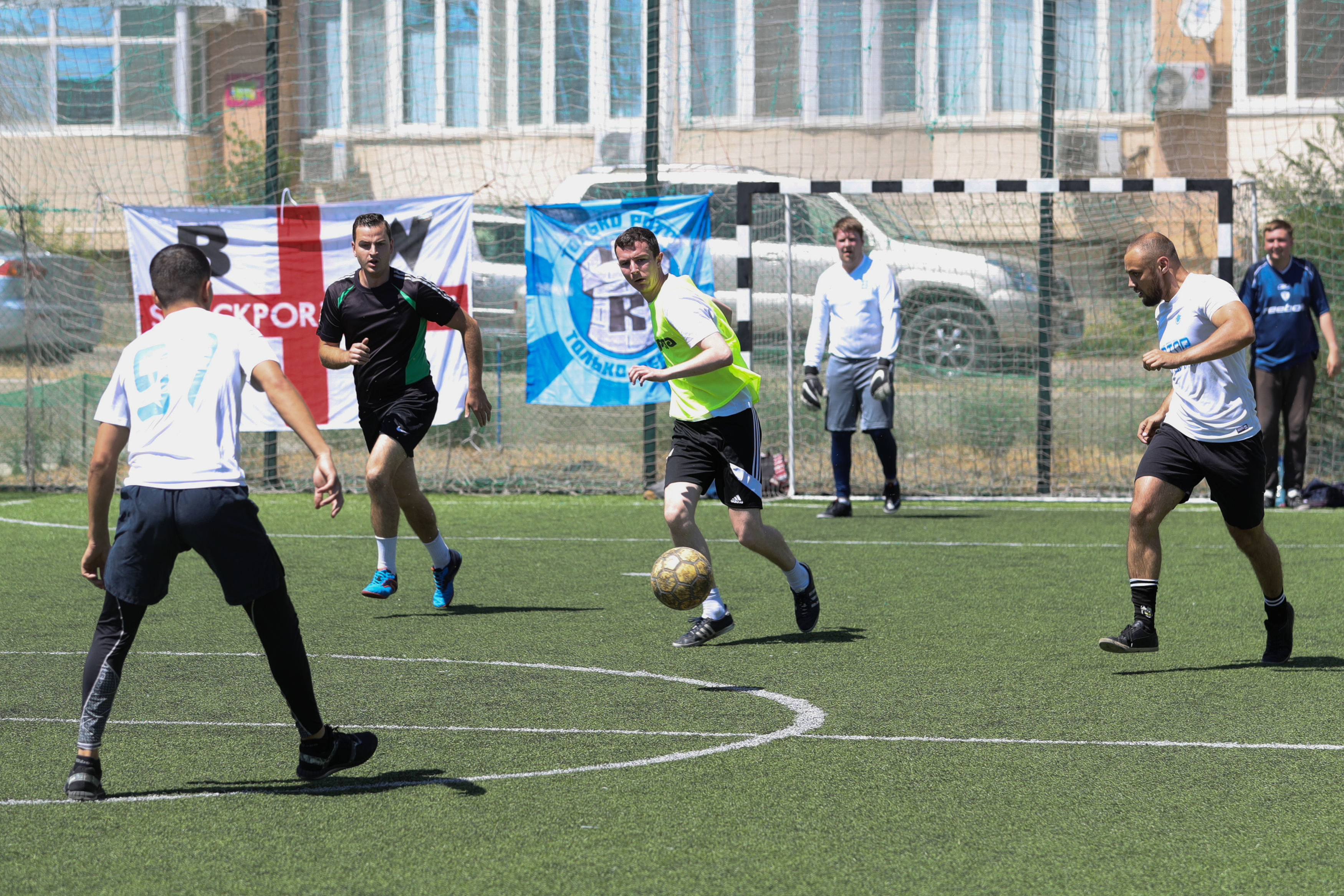 English football fans play against FC Rota Volgograd supporters in a five-a-side football match