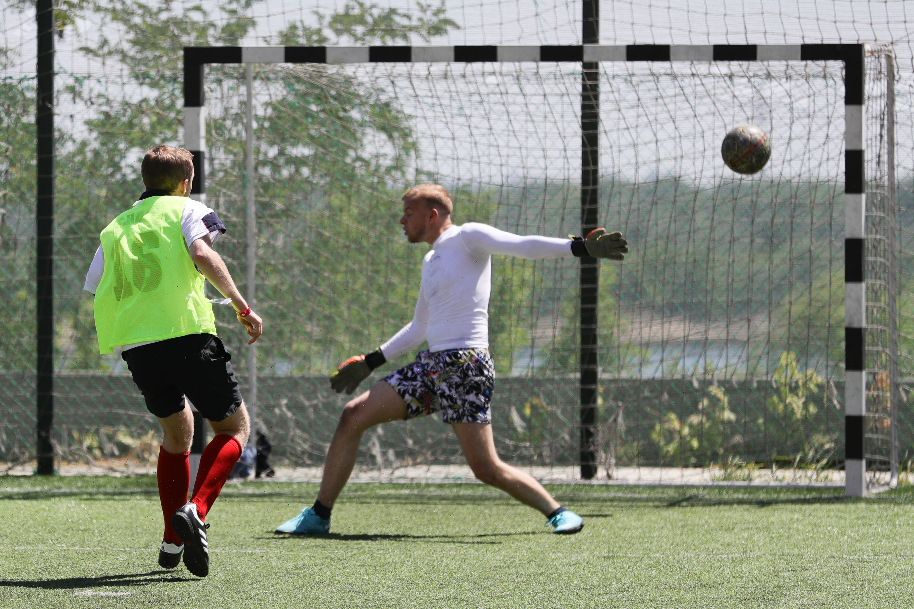 English football fans play against FC Rota Volgograd supporters in a five-a-side football match