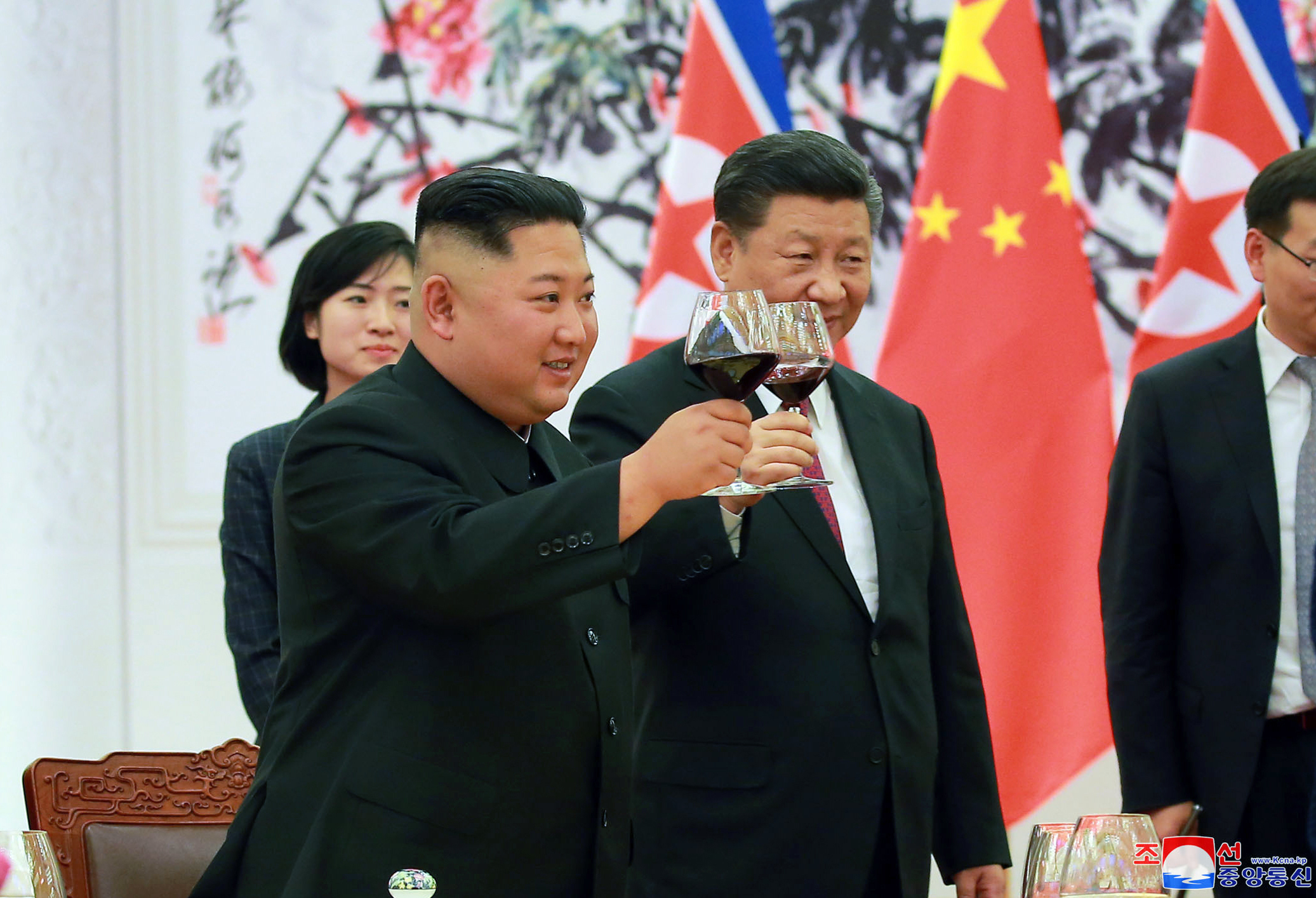 Kim Jong Un with Xi Jinping