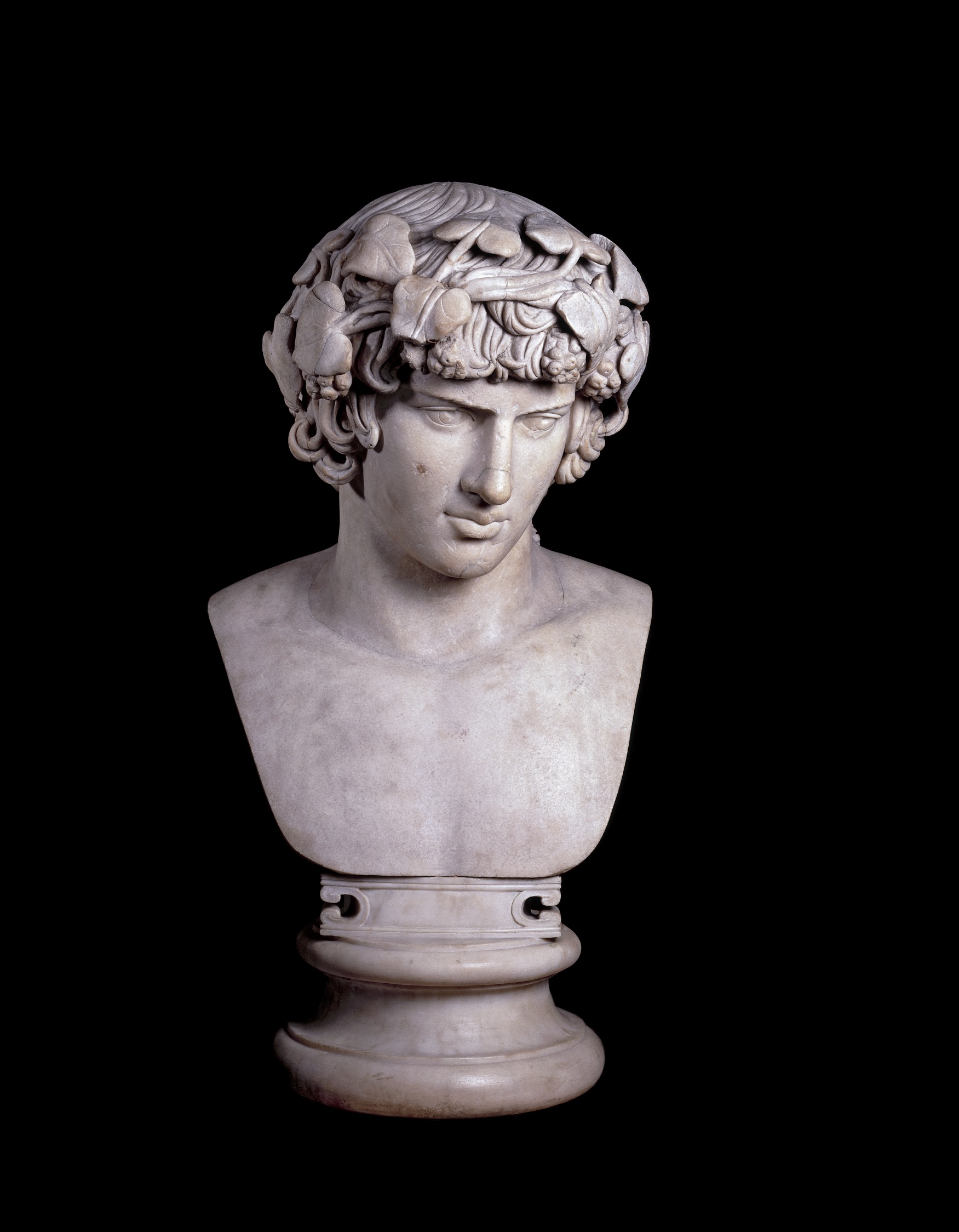 Marble portrait head from a statue of Antinous (AD130), favourite of the Emperor Hadrian, (The Trustees Of The British Museum)