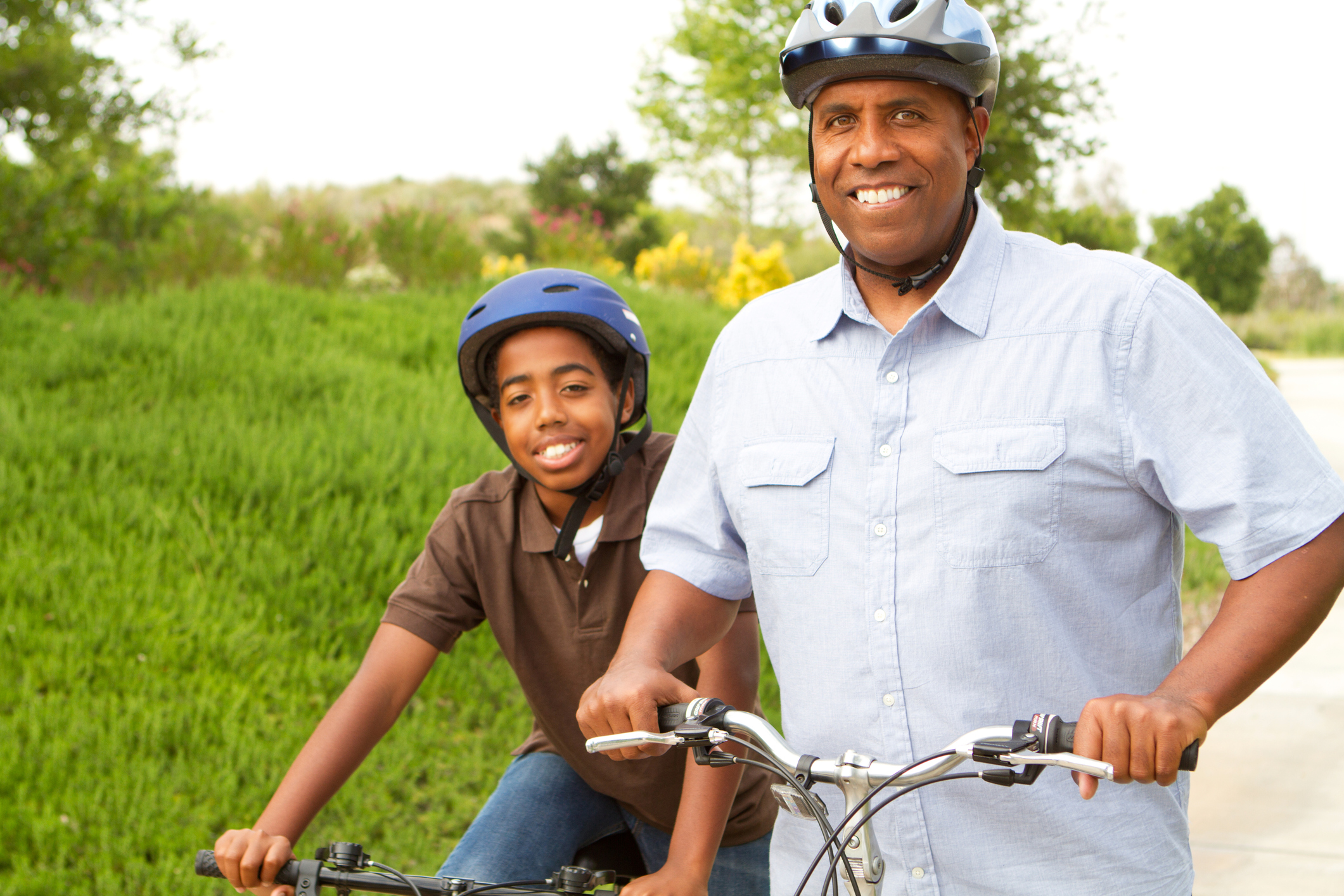Father and son spending time together riding bikes.