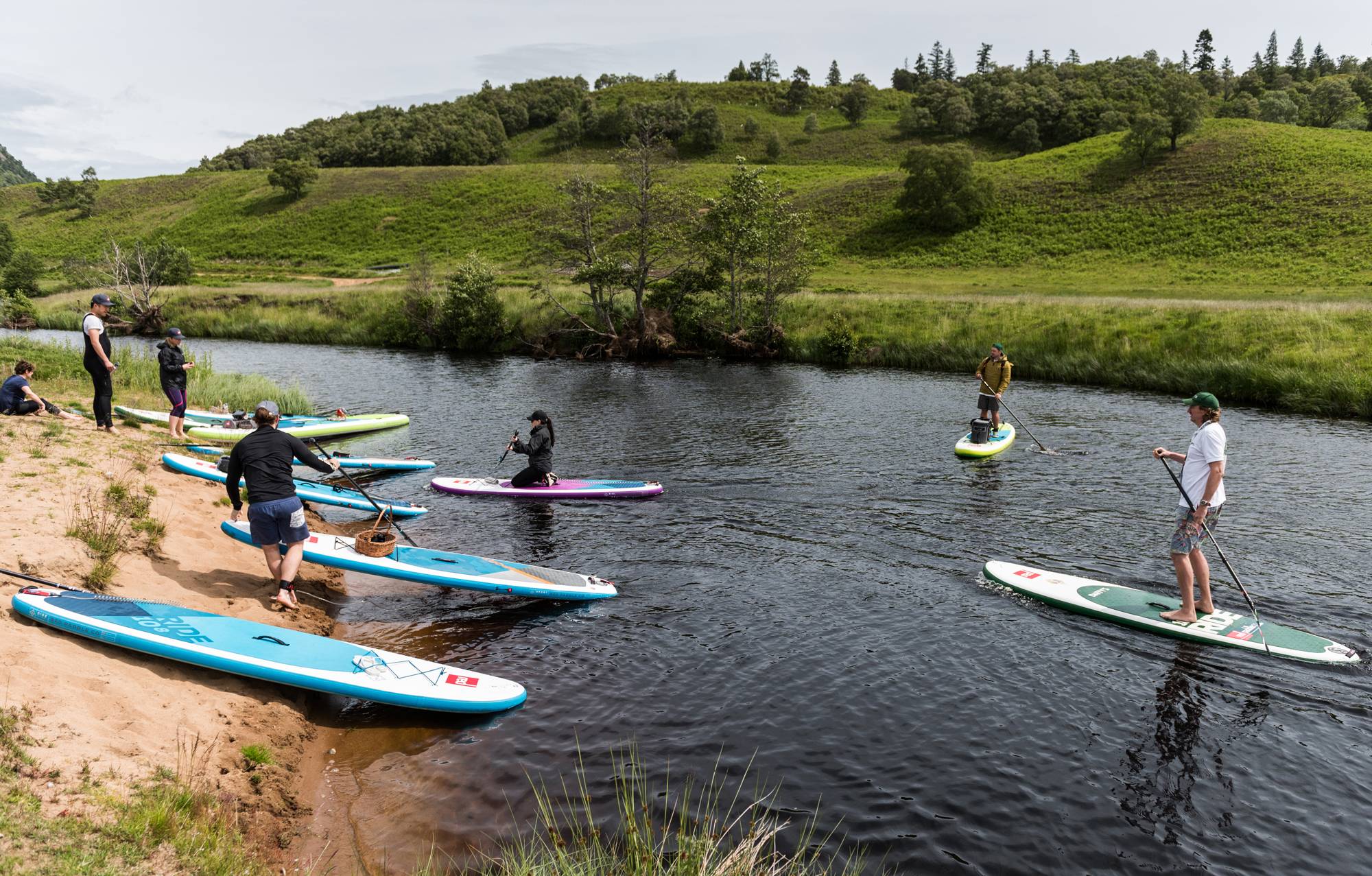 Abi Jackson and fellow group members on a guided SUP trip in Scotland, with Red Paddle Co and Daffy's Gin (Ed Smith Photography/PA)