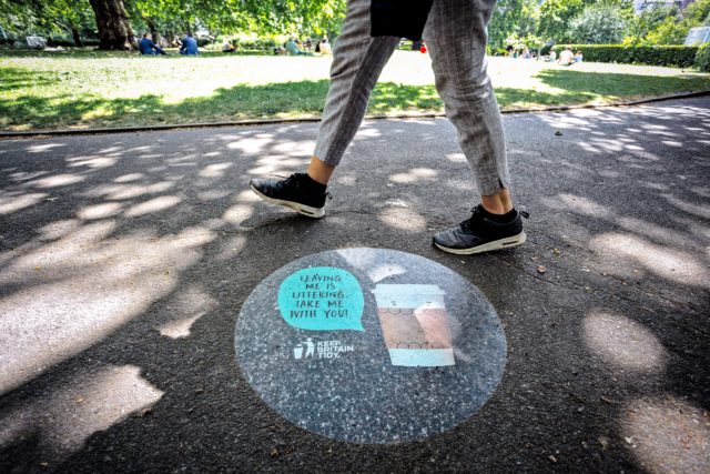 The campaign uses signs to remind people that carefully leaving their rubbish behind is still littering (Keep Britain Tidy/PA)