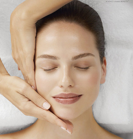 close up of woman getting a facial treatment