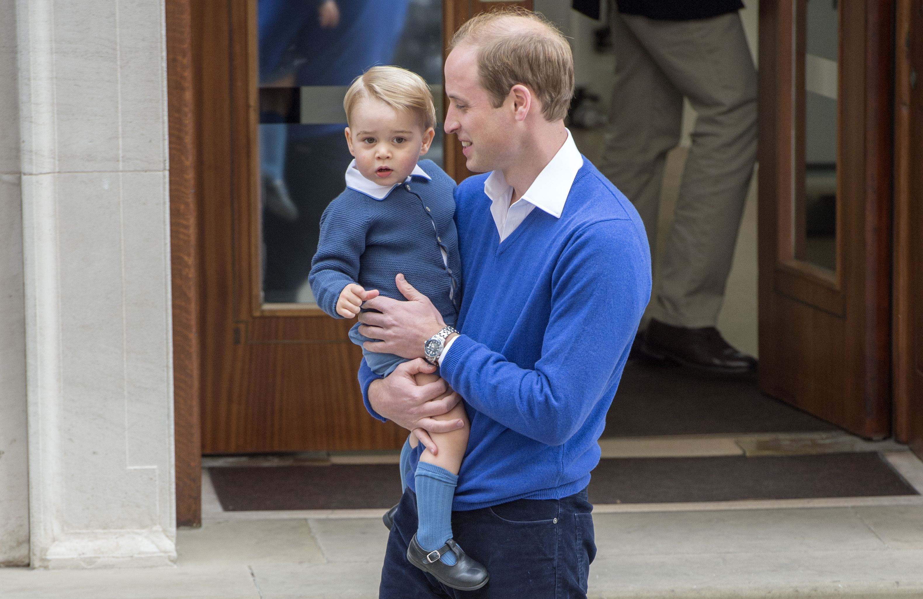The Duke of Cambridge with his son Prince George as he arrives at the Lindo Wing of St Mary's Hospital in London, after the birth of his newborn daughter