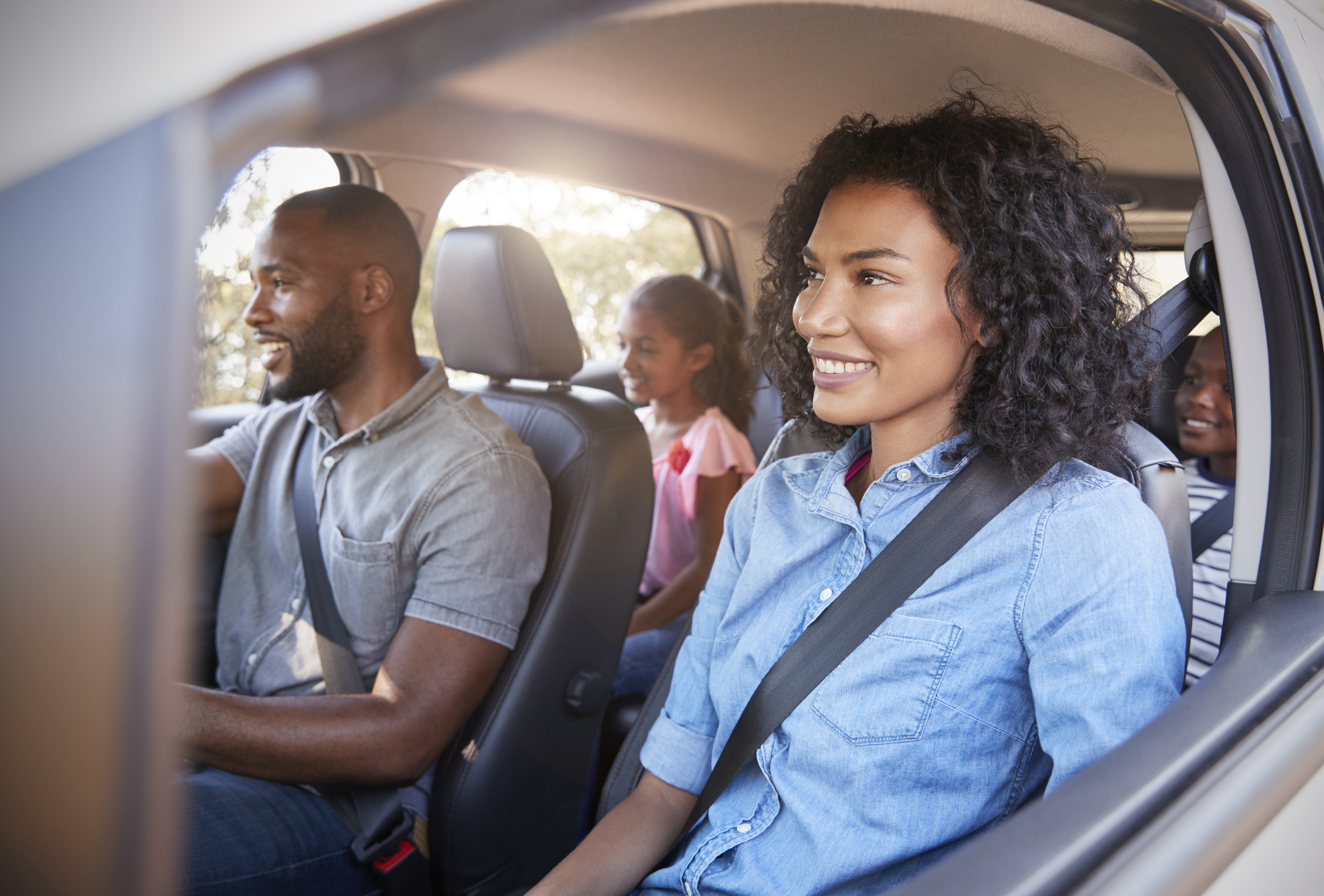 A family of four in their car (Thinkstock/PA)