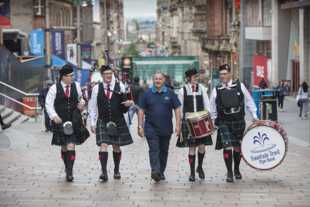 More than 8,000 pipers and drummers will take part in events across Glasgow (Chris James/PA)