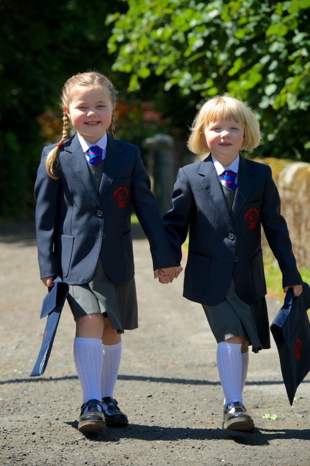 Isla and Rowan with their new school uniforms (Renfrewshire Council/PA)