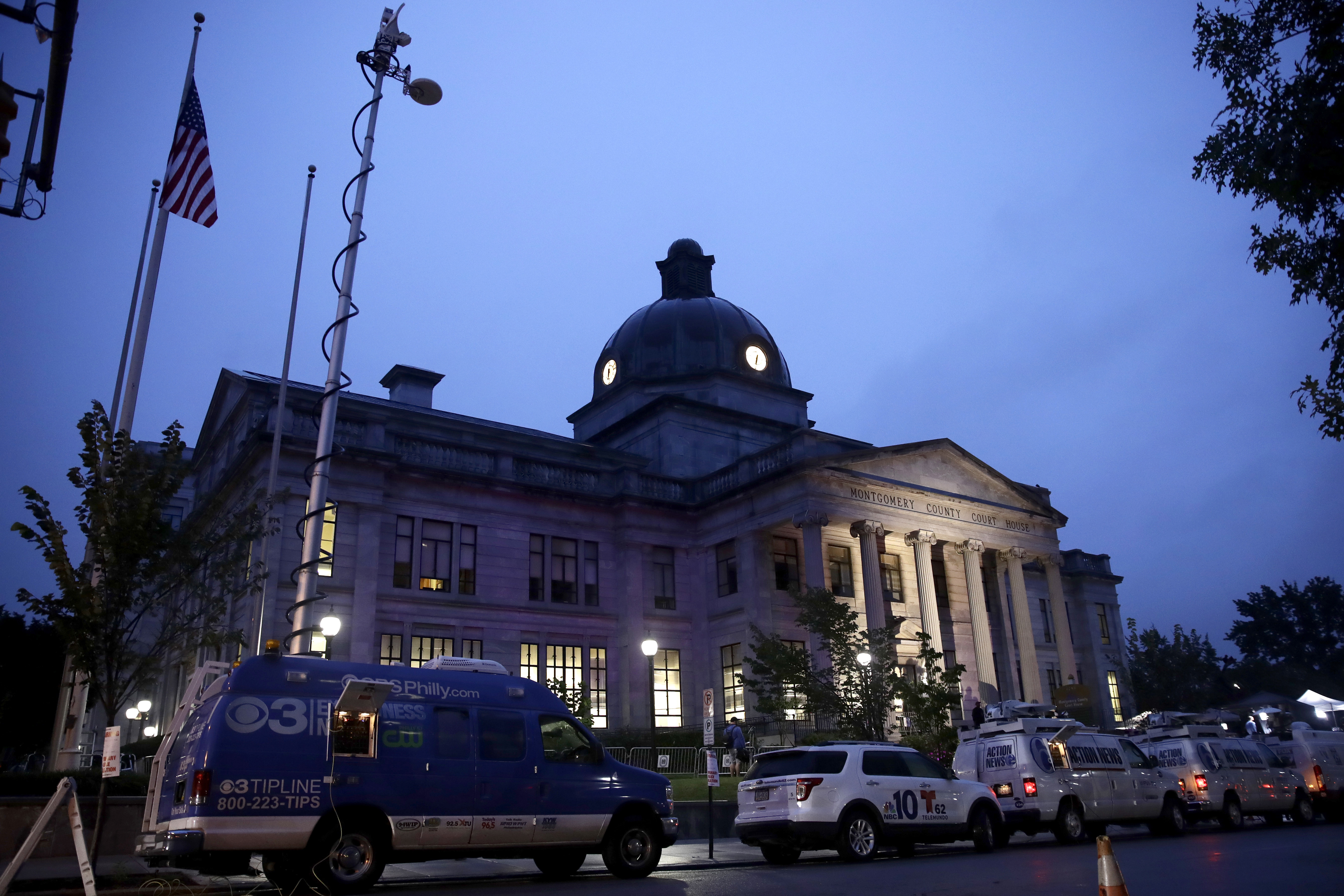 Television vans line the street in front of the Montgomery County Courthouse ahead of Bill Cosby's sentencing