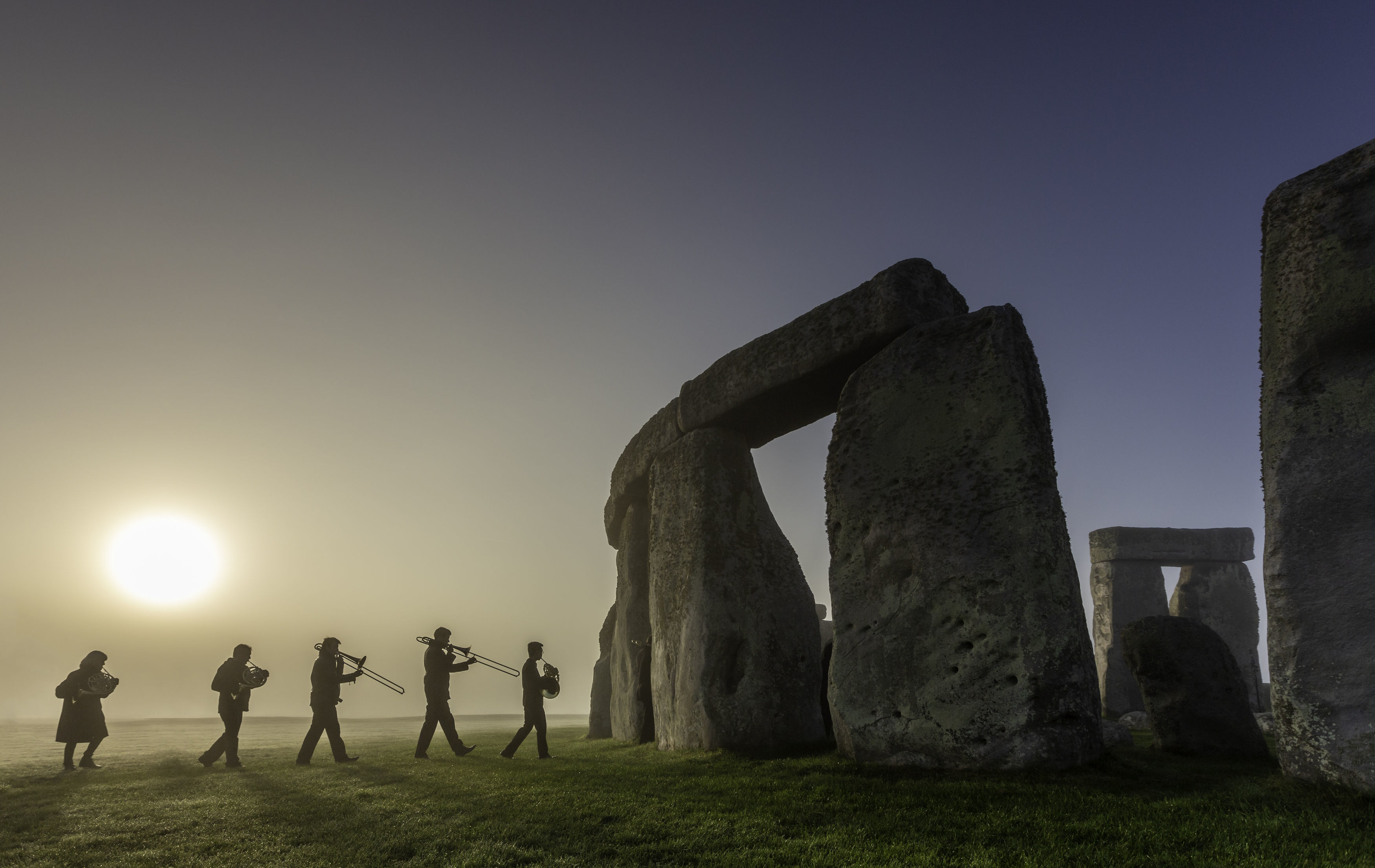 Musicians rehearsing at Stonehenge in Wiltshire ahead of English Heritage's celebrations marking 100 years since Stonehenge was donated to the nation