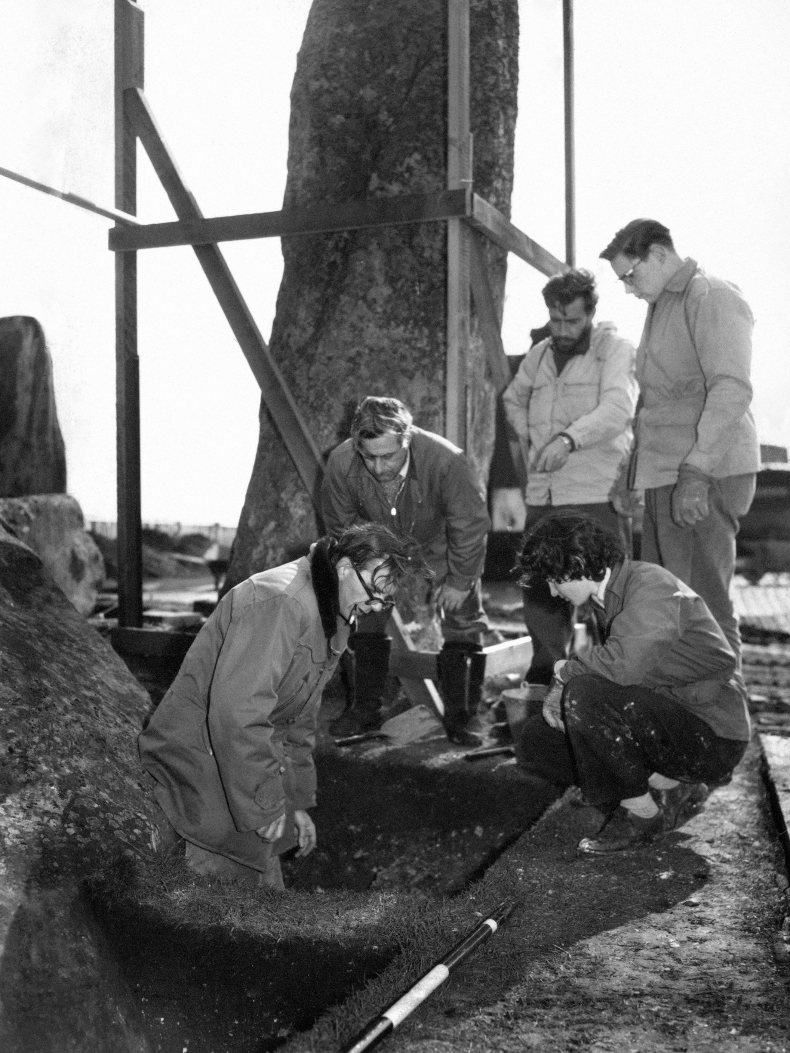 Edinburgh University Professor Richard Atkinson, left, looking for evidence of the origins of Stonehenge in 1958