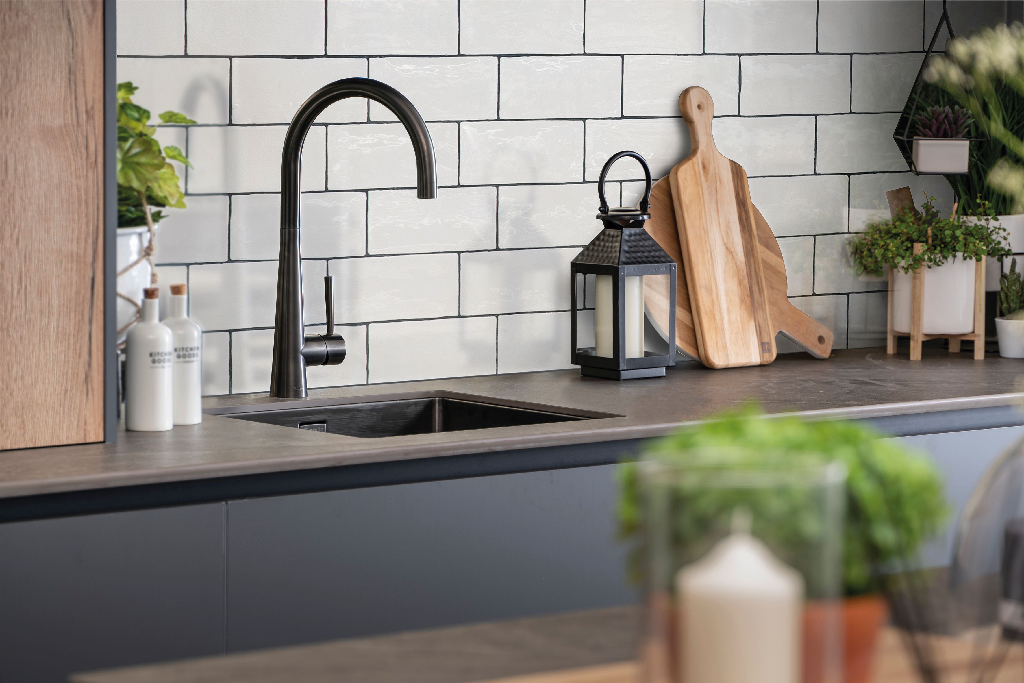 Caple’s Ridley tap comes in a stylish copper and gunmetal finish, from around £238 (shown here with a MODE0345 sink), and features a popular, elegant swan neck, single lever design (Caple/PA)