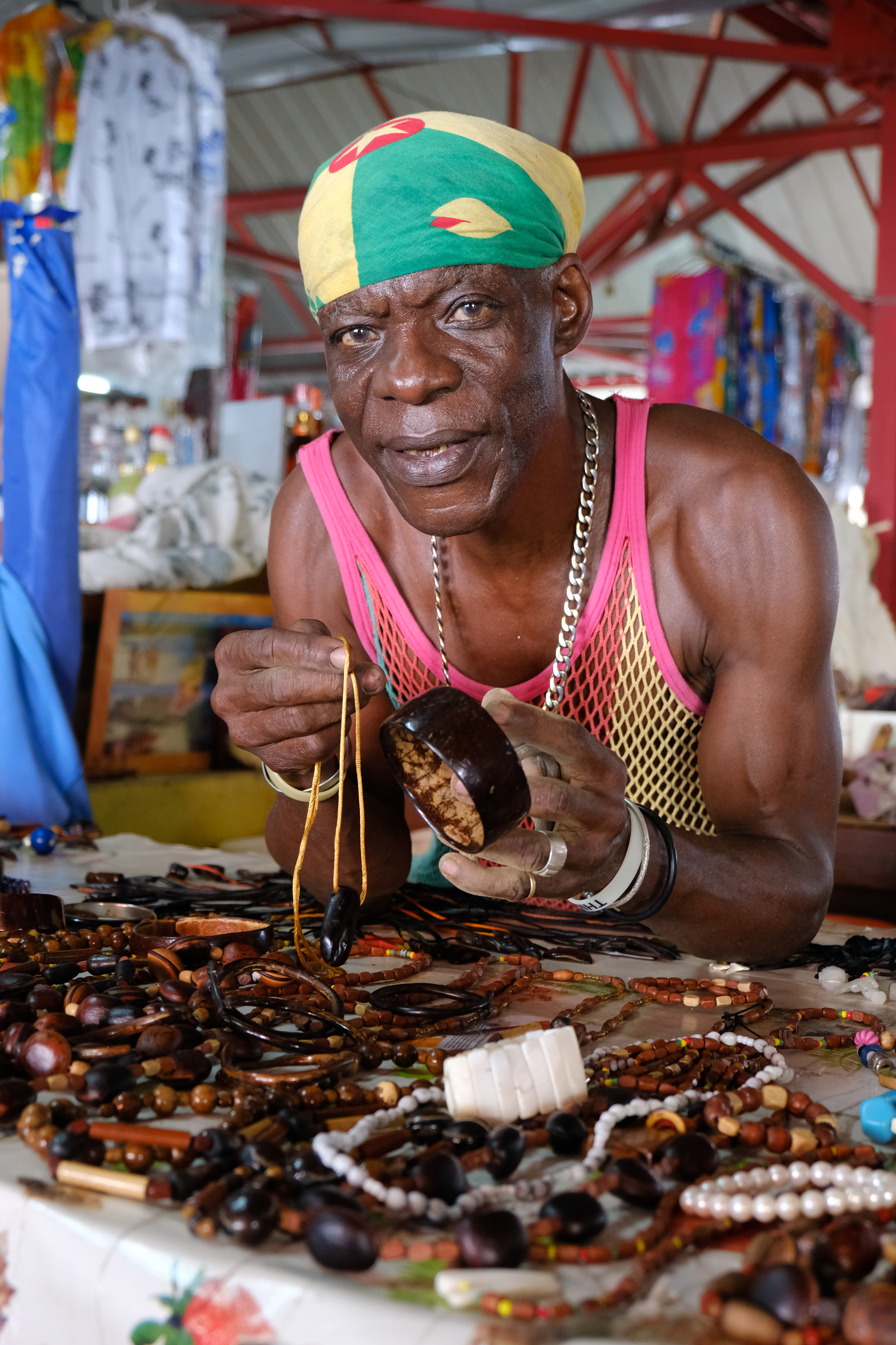 A local sells his own hand-made jewellery in the market (Stephen Patterson/PA)