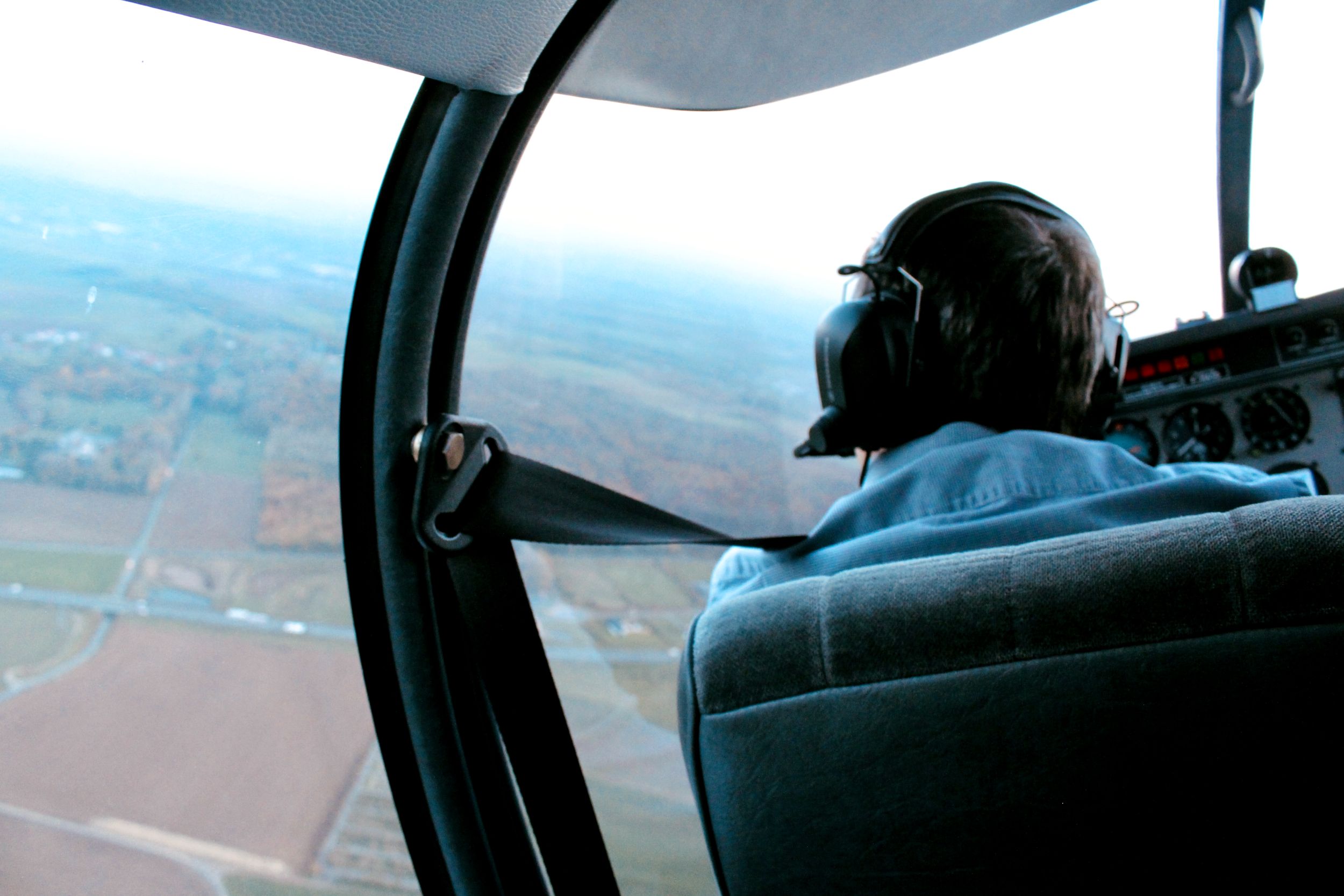 Pilot Francois Mobaillyn tilts the aircraft to show where Douglas Bader landed after his stricken Spitfire was severely damaged during a dogfight with Messerschmitt 109s over the town (Chris Wiltshire/PA)