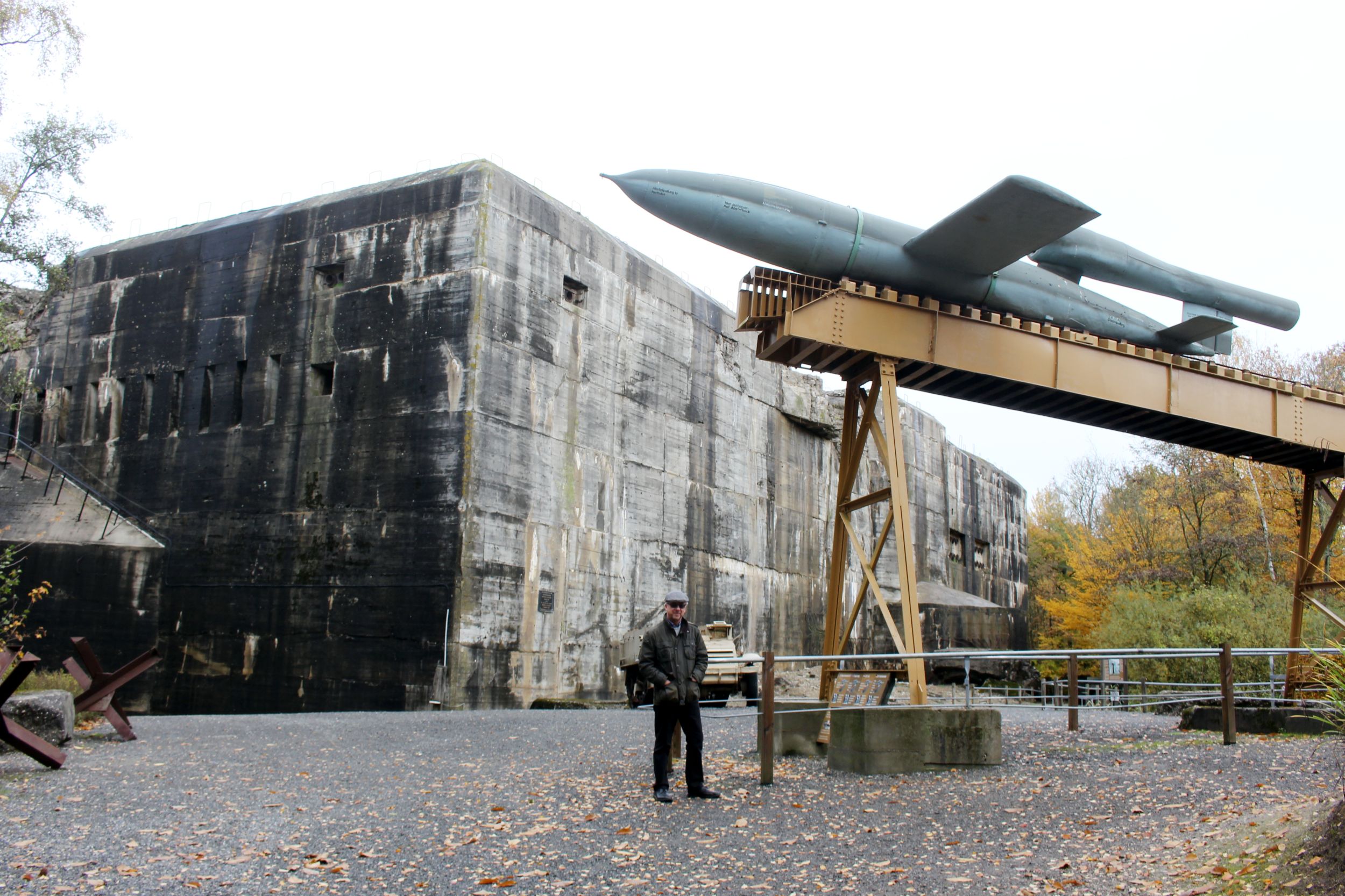 Chris Wiltshire is dwarfed by a V1 rocket at the Blockhaus d’Eperlecques, but it was the feared V2 rockets that were the biggest concern for the Allies