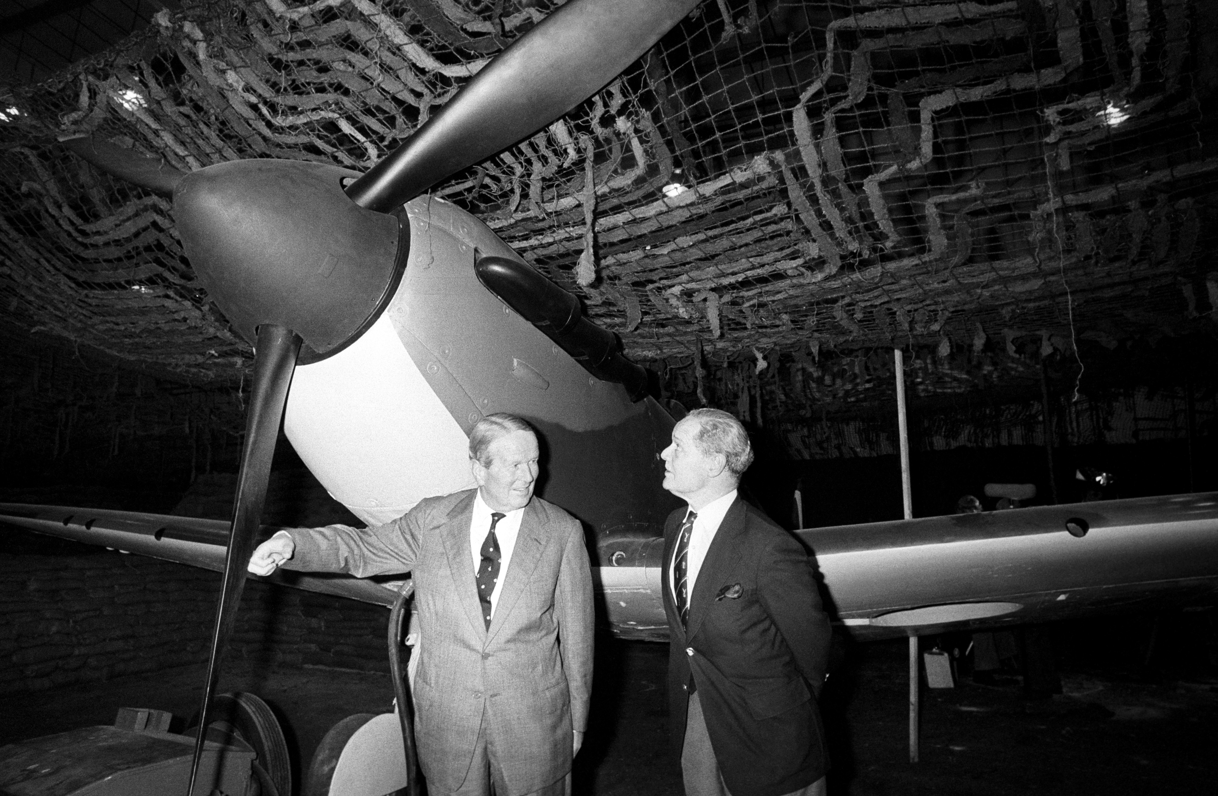 Former Battle of Britain Group Captain's Sir Douglas Bader (right) and John Cunningham discuss old times in front of a Spitfire when they attended a preview of the new Battle of Britain Museum (PA Archive)