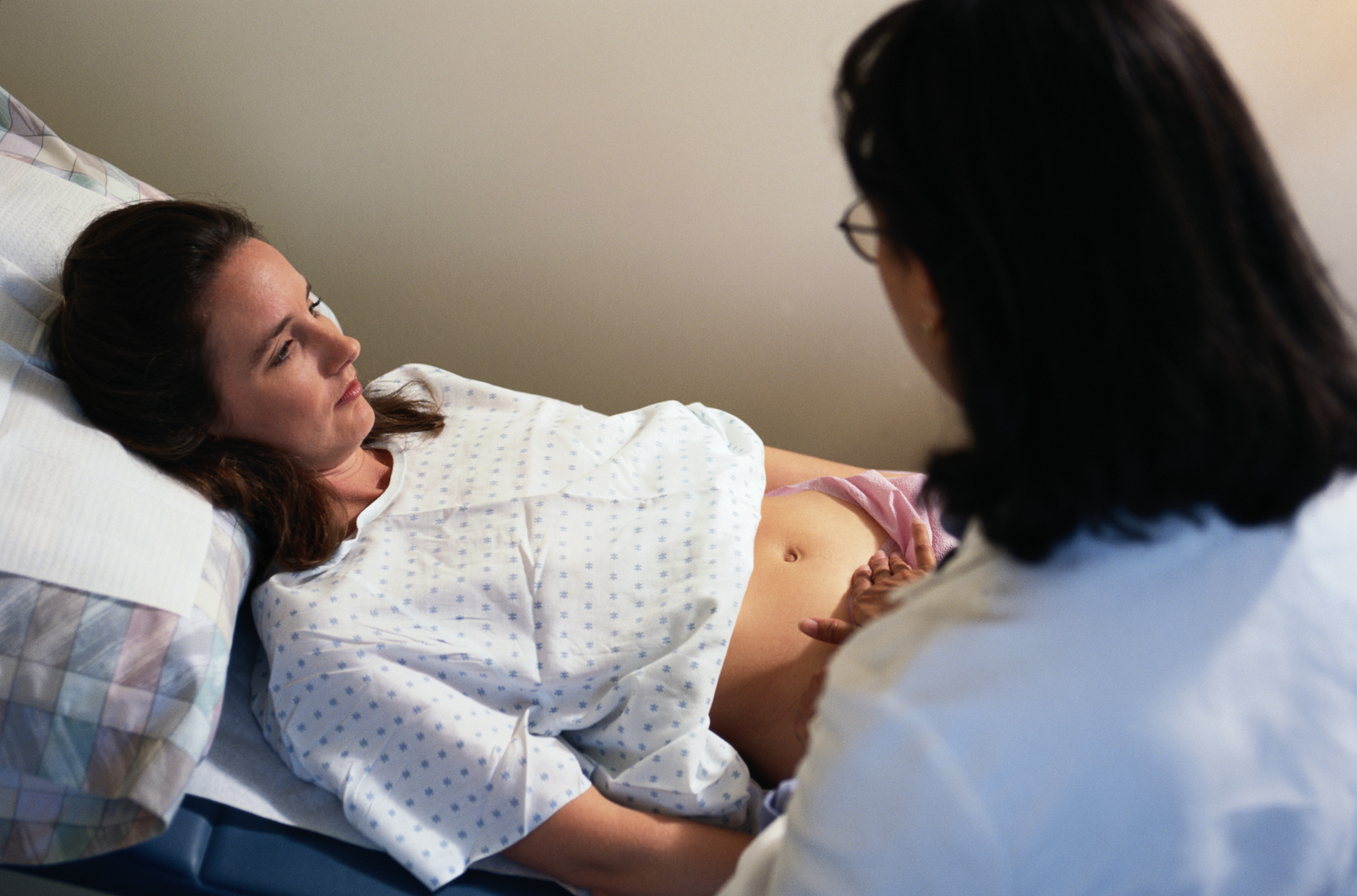 A pregnant woman at an ante-natal appointment.