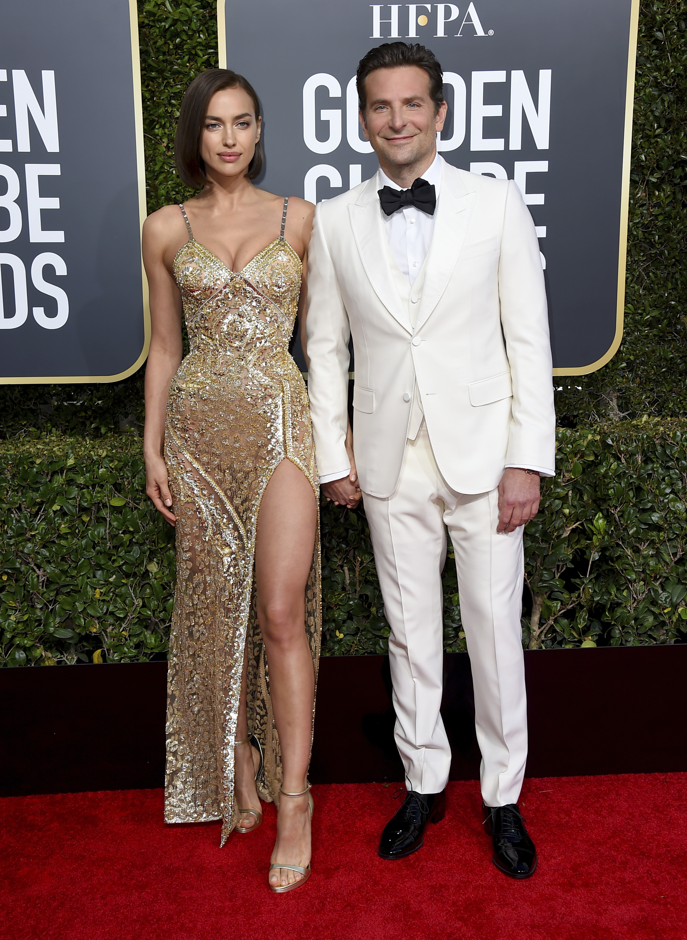 Irina Shayk, left, and Bradley Cooper arrive at the 76th annual Golden Globe Awards