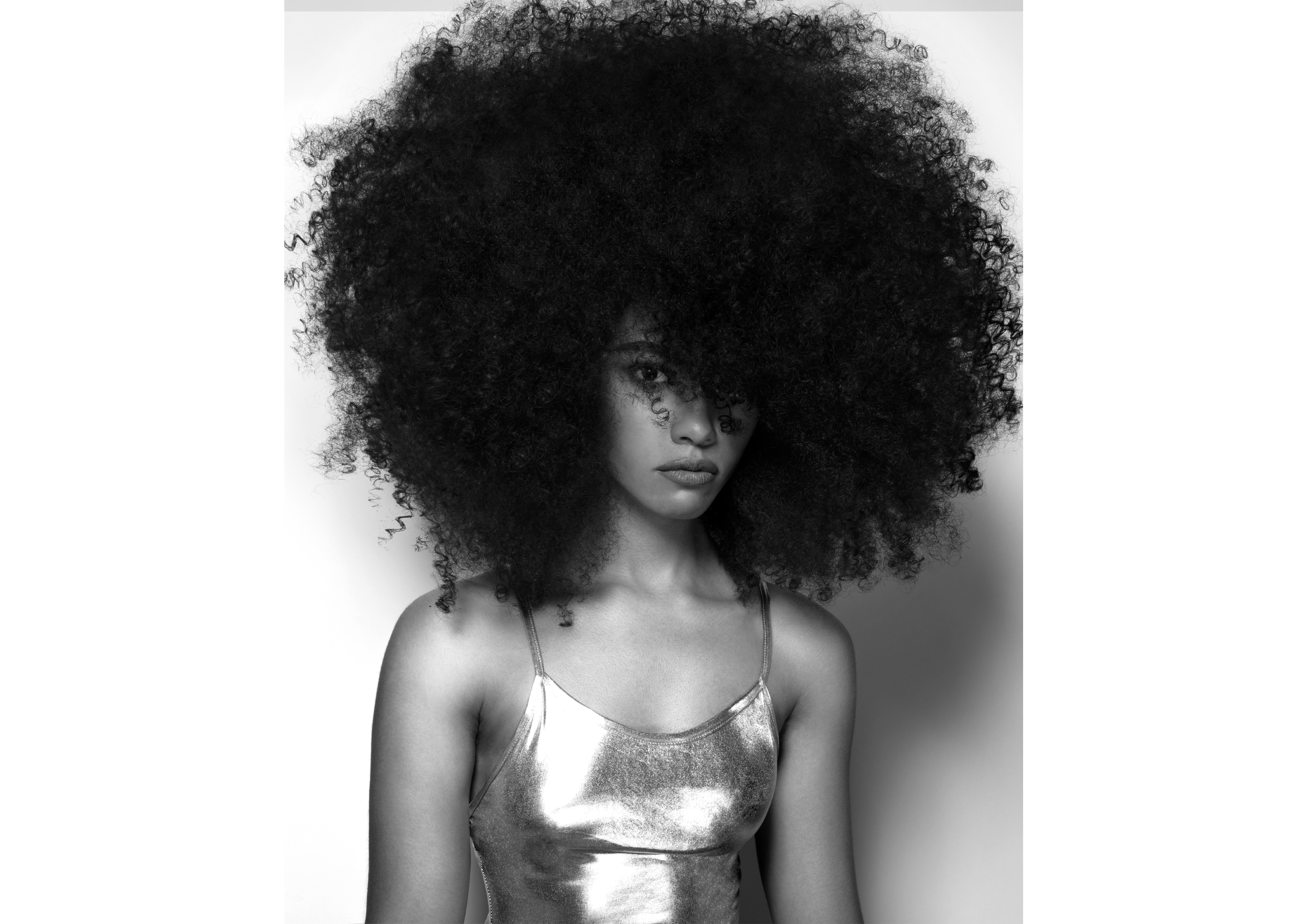 A woman with a large afro