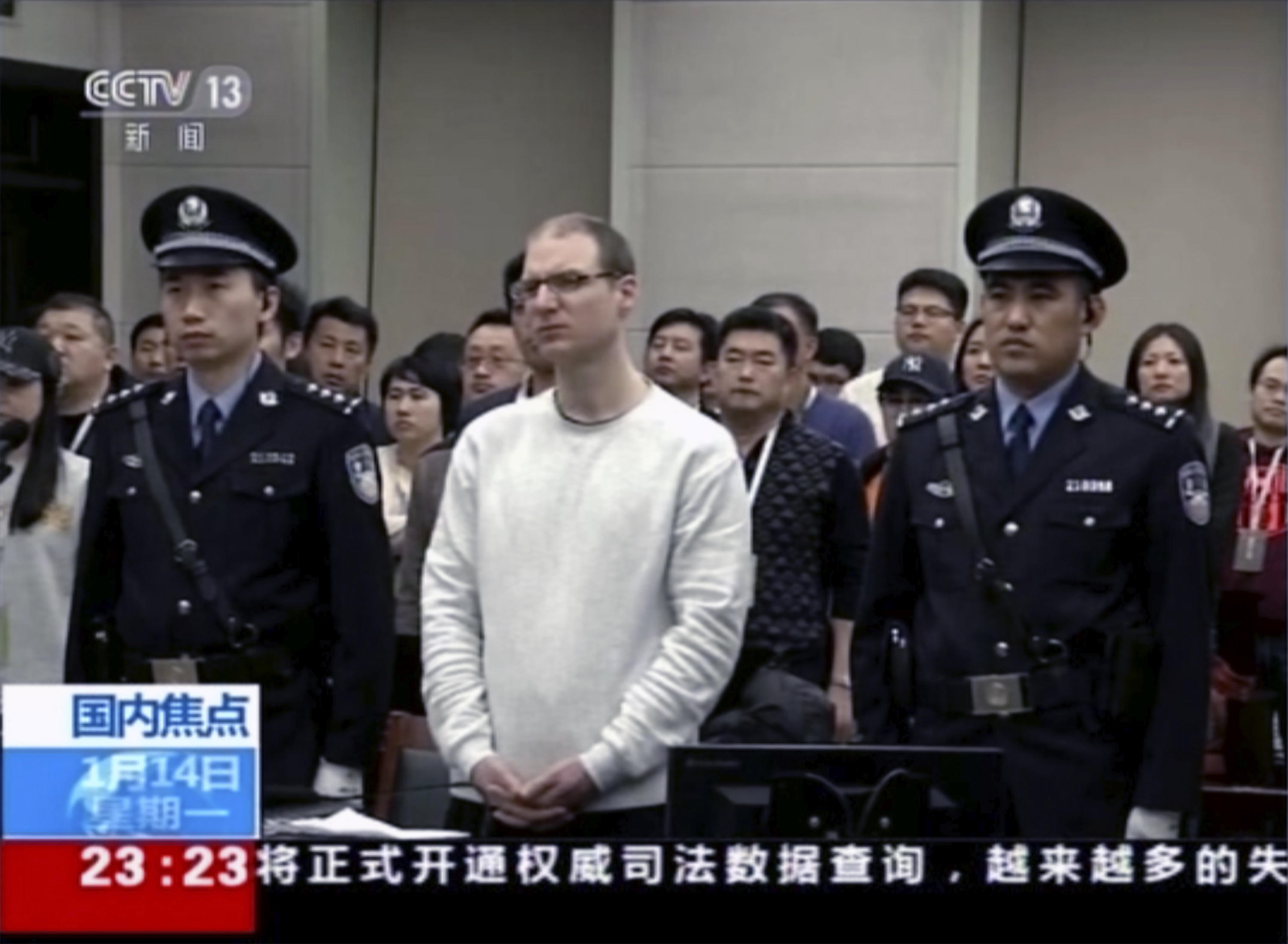 Canadian Robert Lloyd Schellenberg attends his retrial