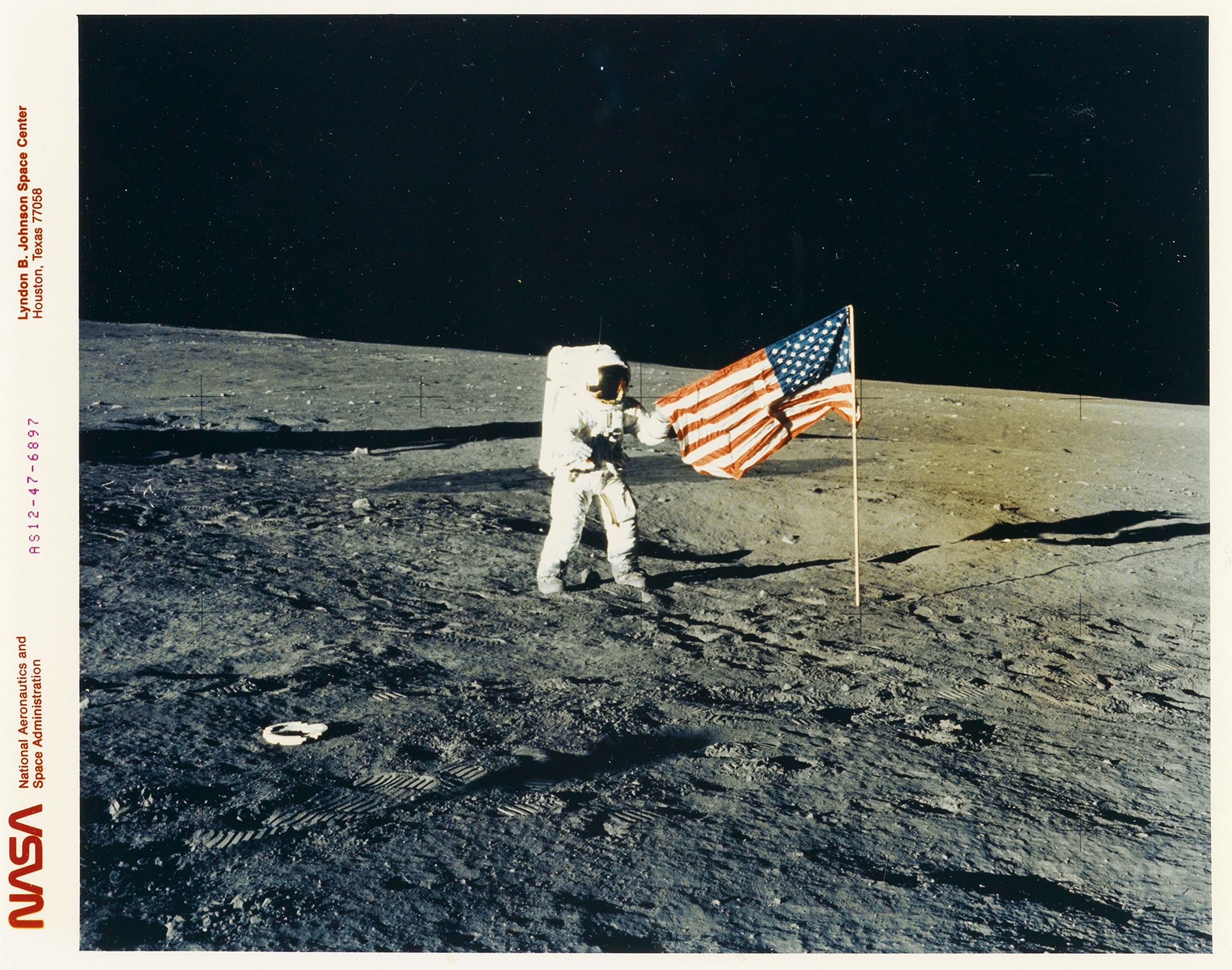 An astronaut with the American flag.