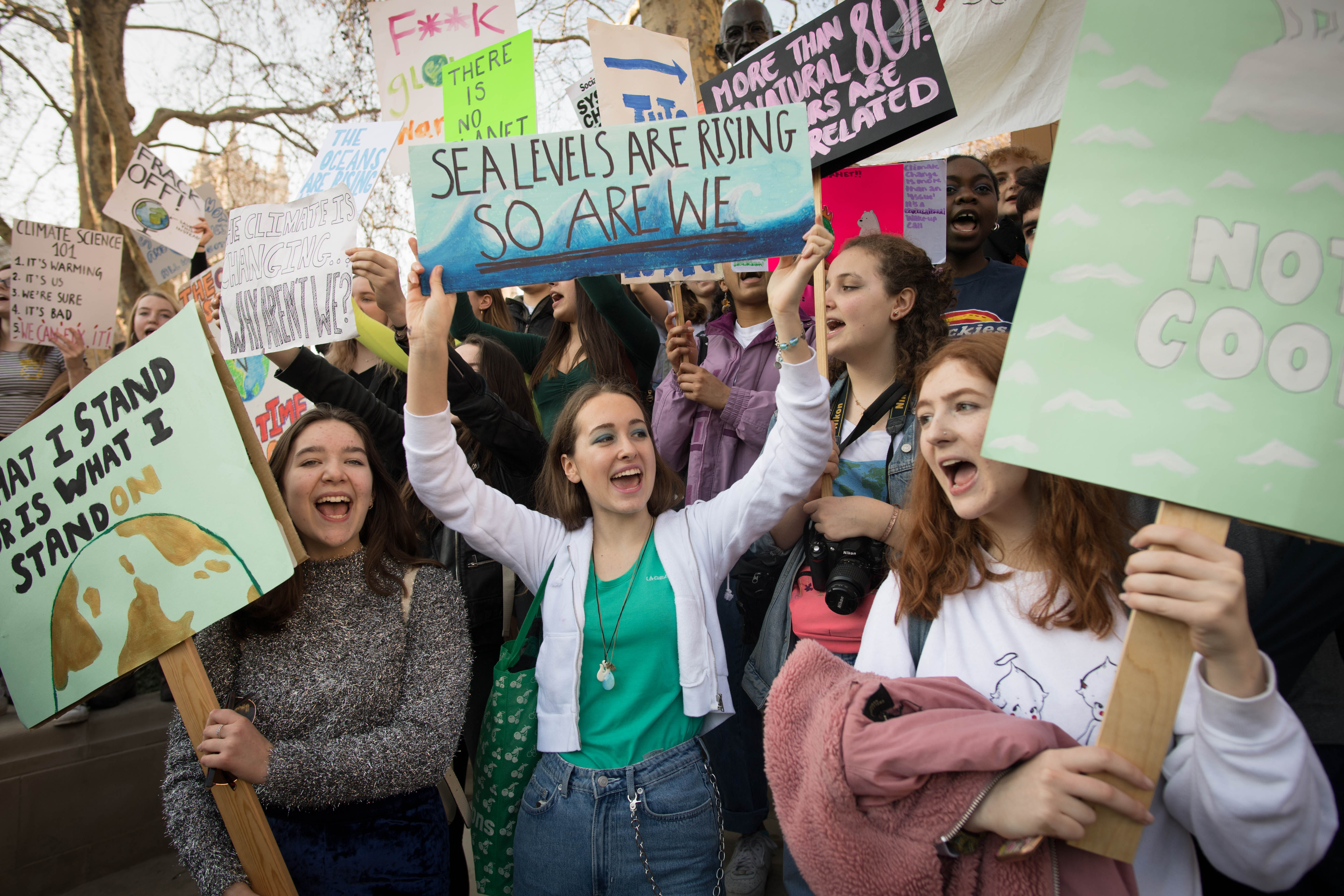 Students from the Youth Strike 4 Climate movement during a climate change protest on Parliament Square in Westminster, London