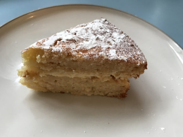 A slice of apple and lemon cake from Mary Berry Quick Cooking made by Prudence (Prudence Wade/PA)