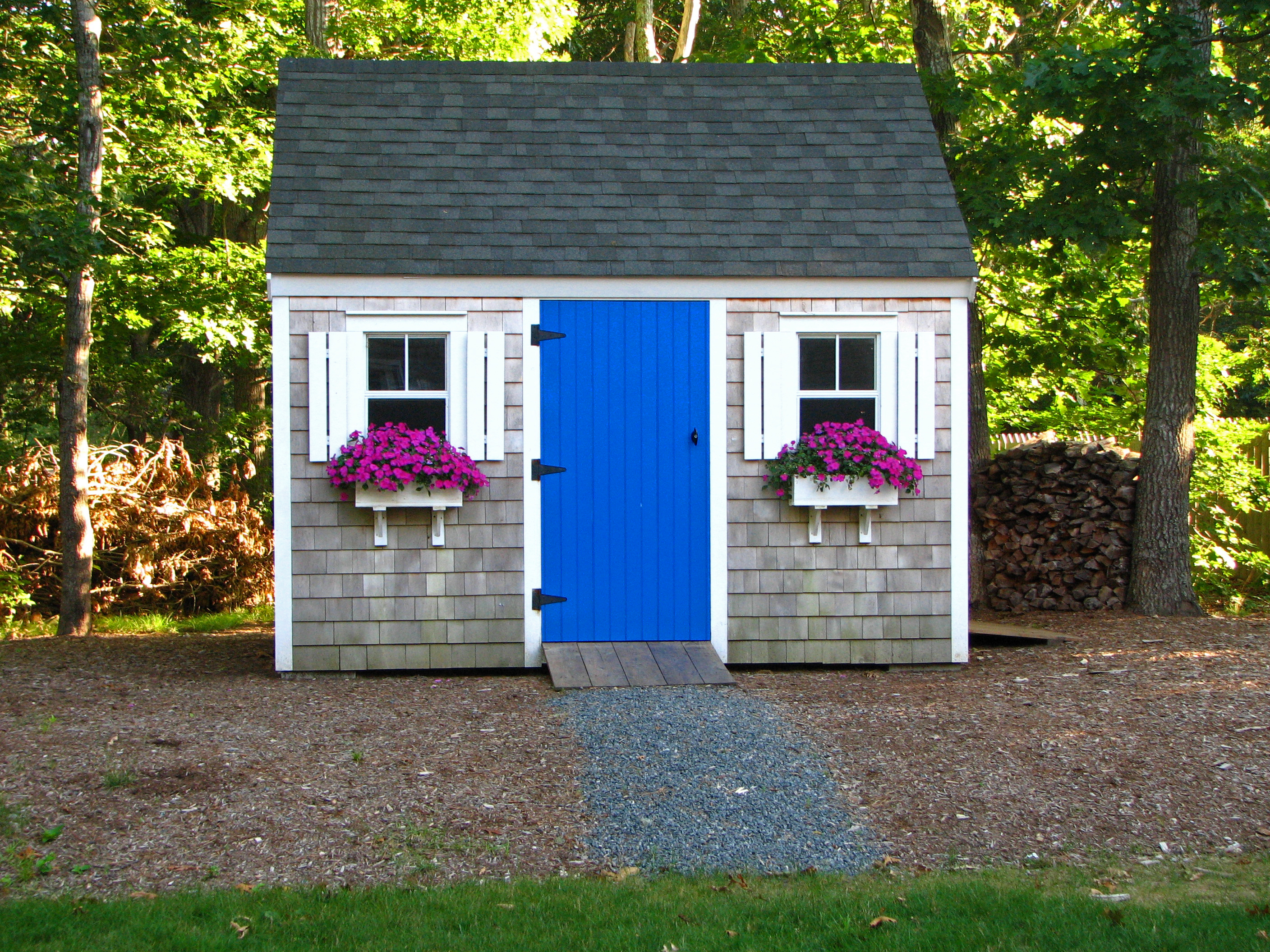 A shed that resembles a cottage