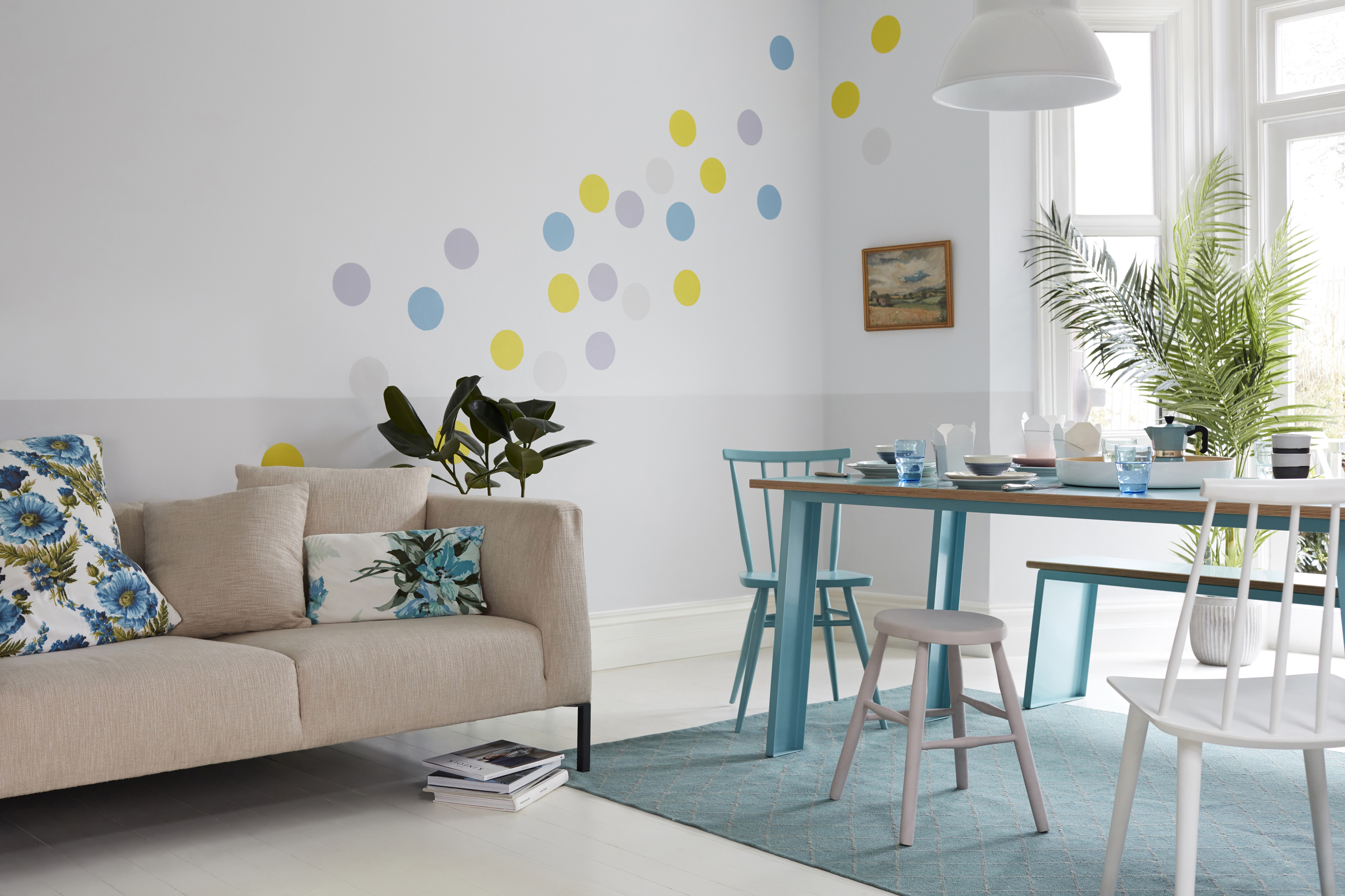 Accents of blue unify an open plan space. (Dulux/PA)