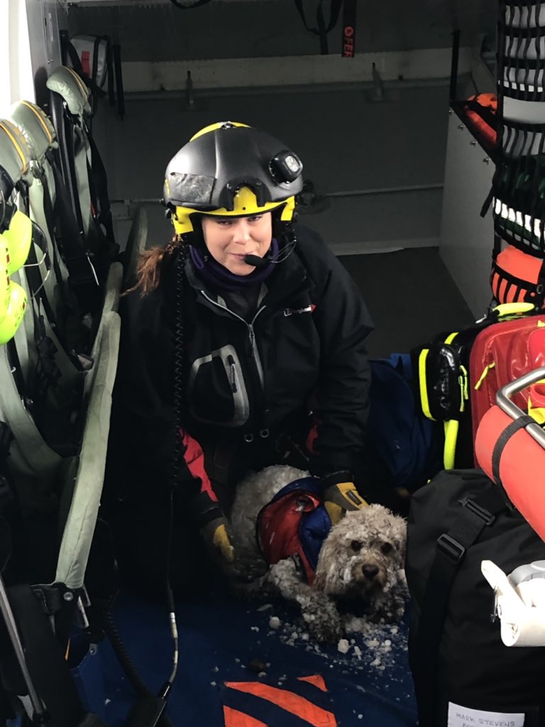 Winchman Kate Willoughby cuddles up to Ben after the rescue